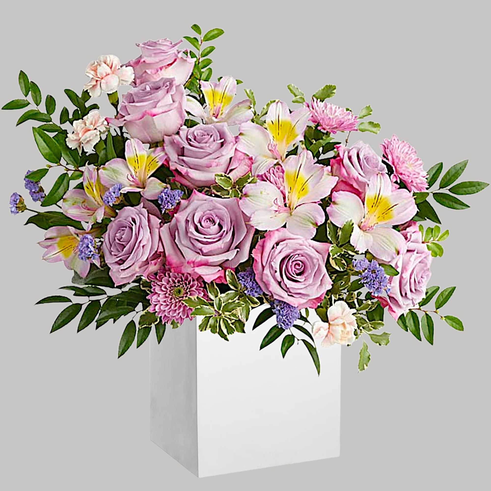 Make spring shimmer with this luxurious lavender arrangement, hand-delivered in a wooden