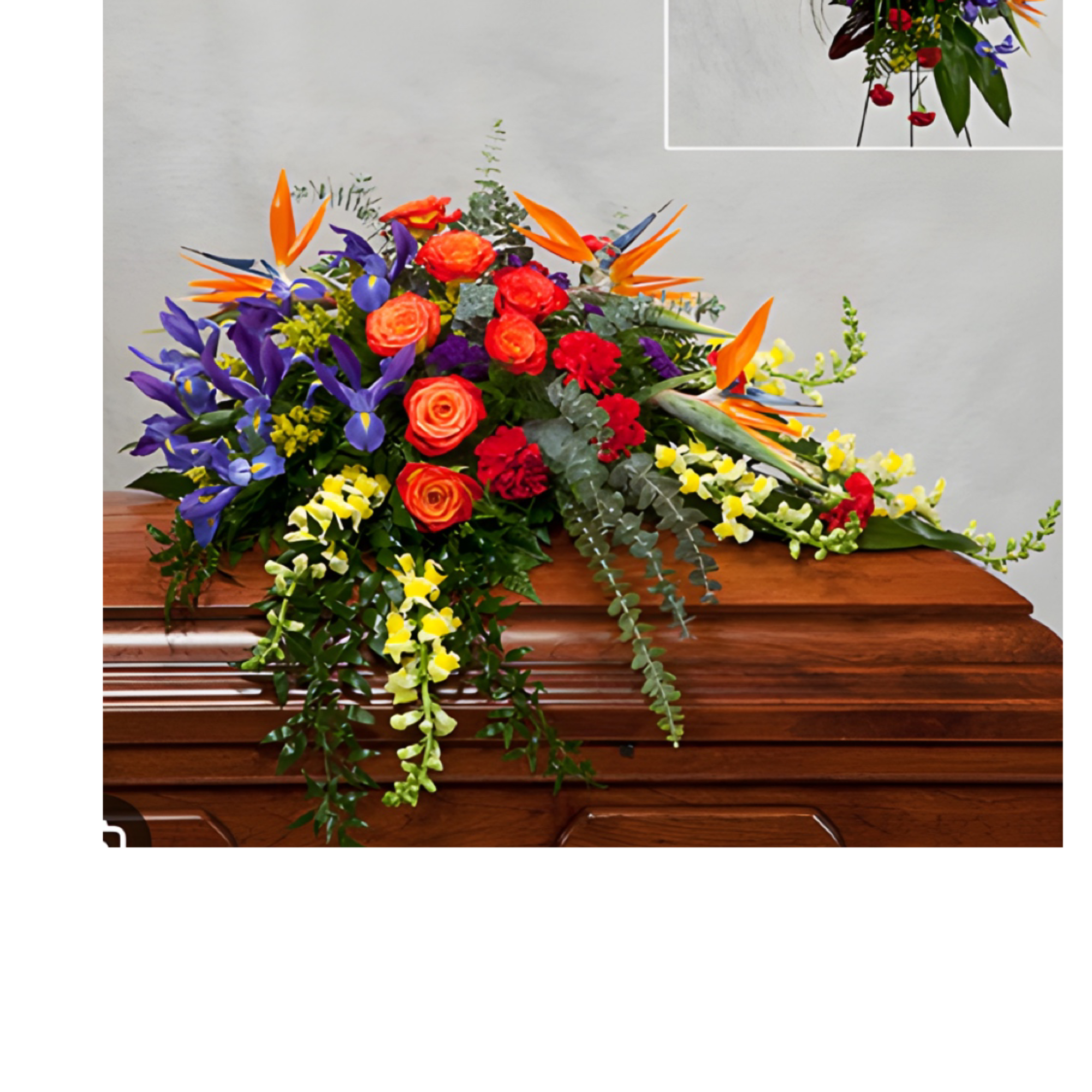 A  favorite framed  photo tribute  adorned with cascading tropical