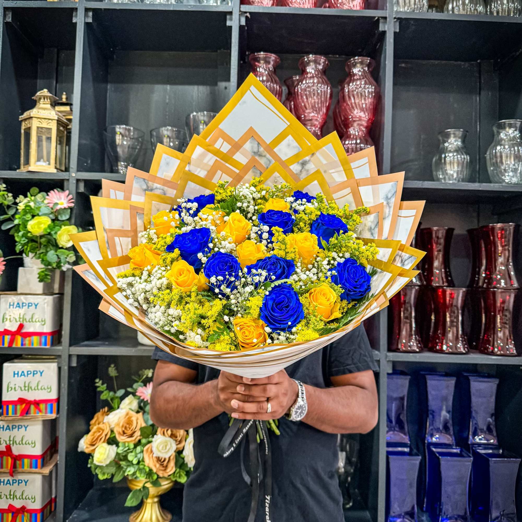 Brighten someone&rsquo;s day with our stunning Blue and Yellow Roses Bouquet. This
