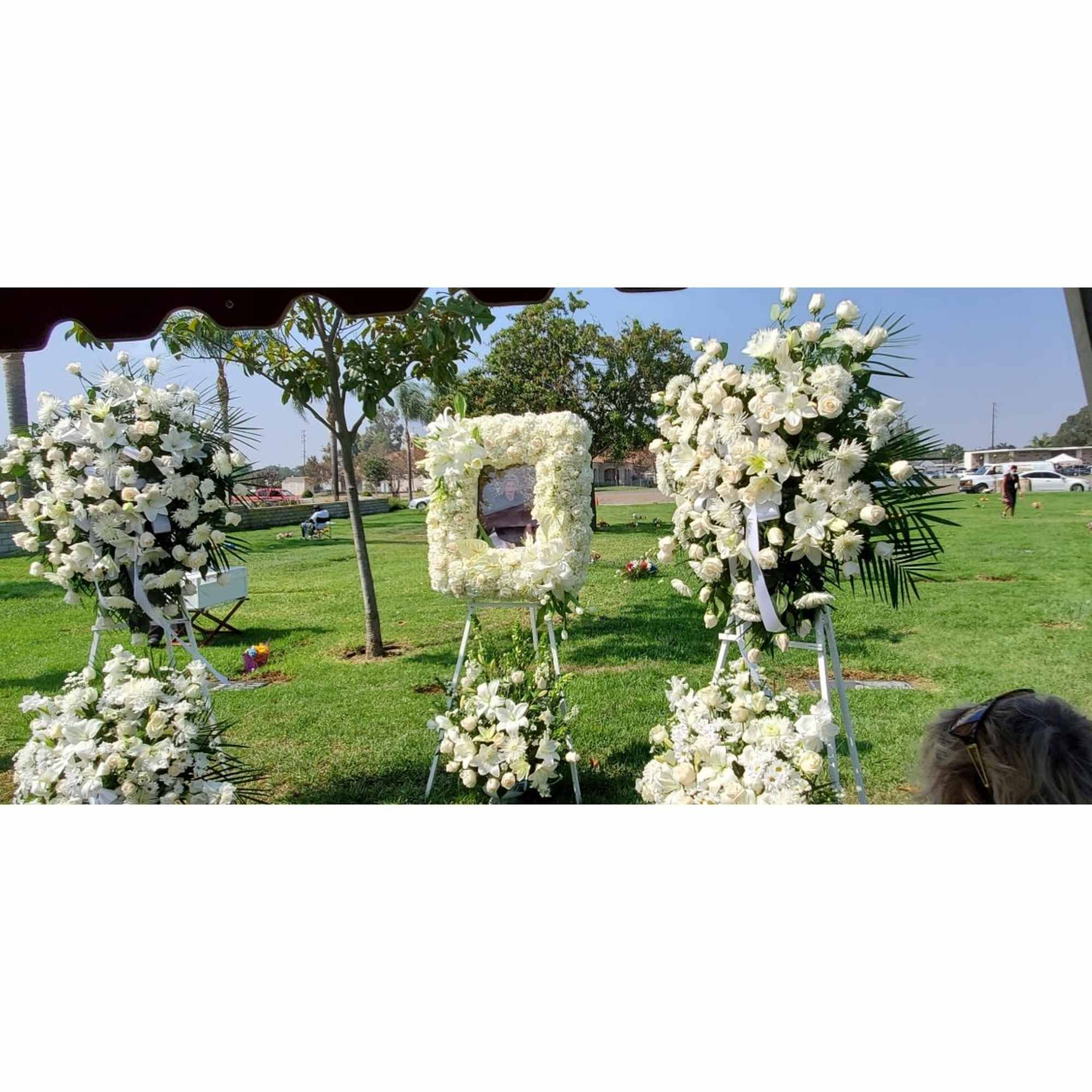 This exquisite, handcrafted floral tribute is a touching way to honor the