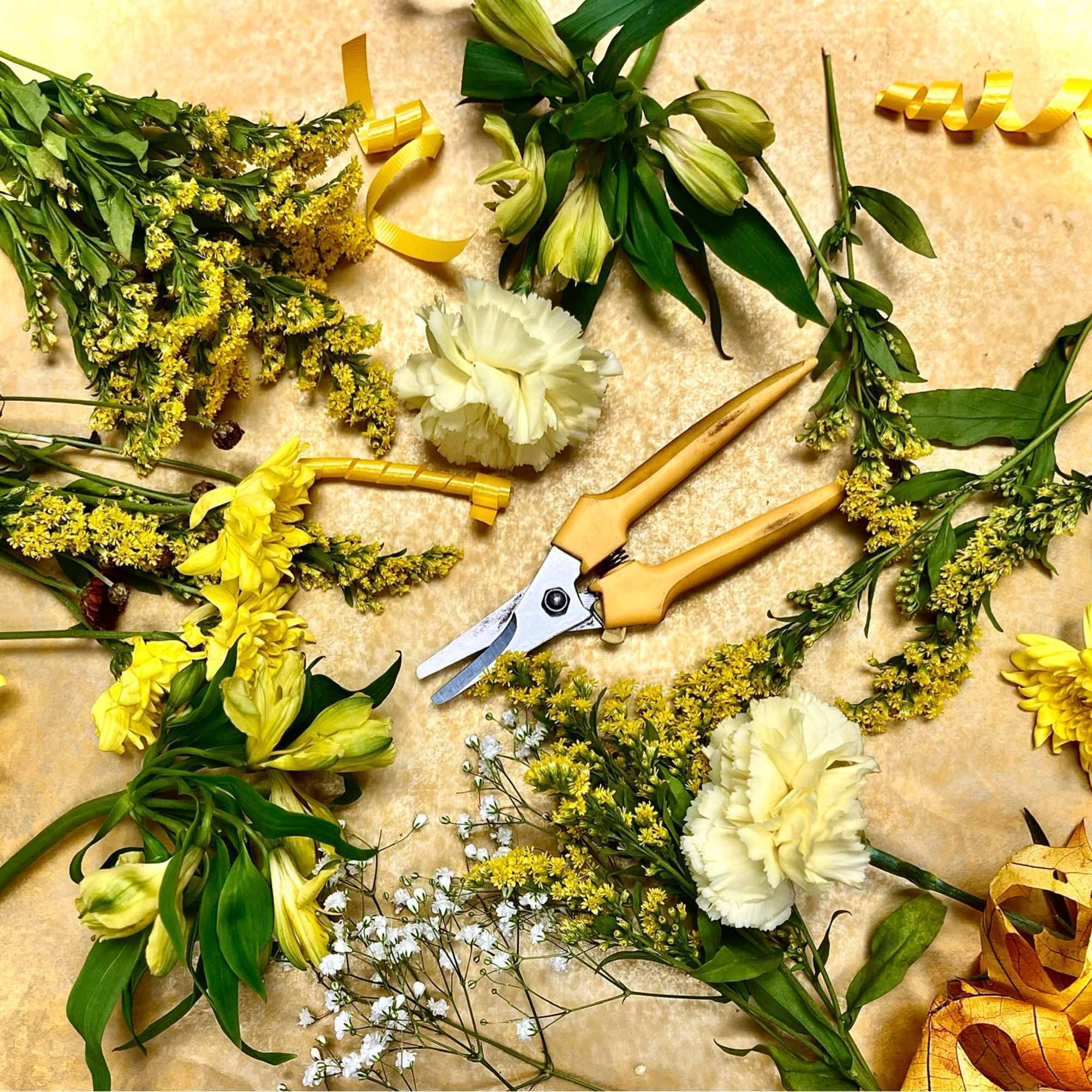 We will hand select the freshest flowers in shades of yellow and