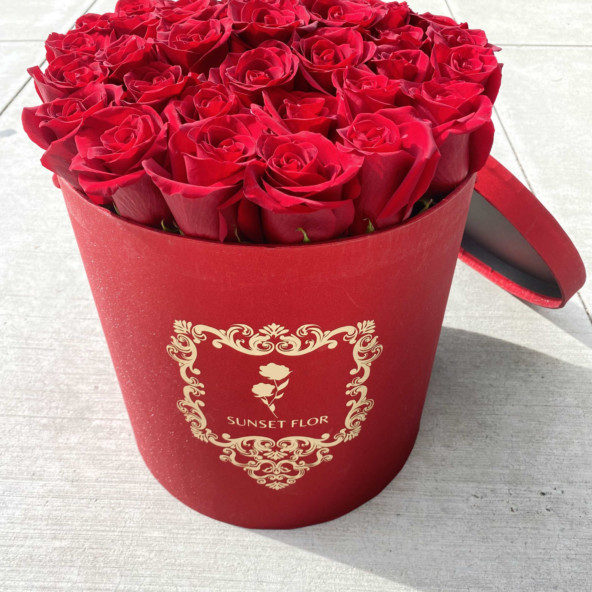 Gift the ultimate gift of love with these dozen fresh red roses