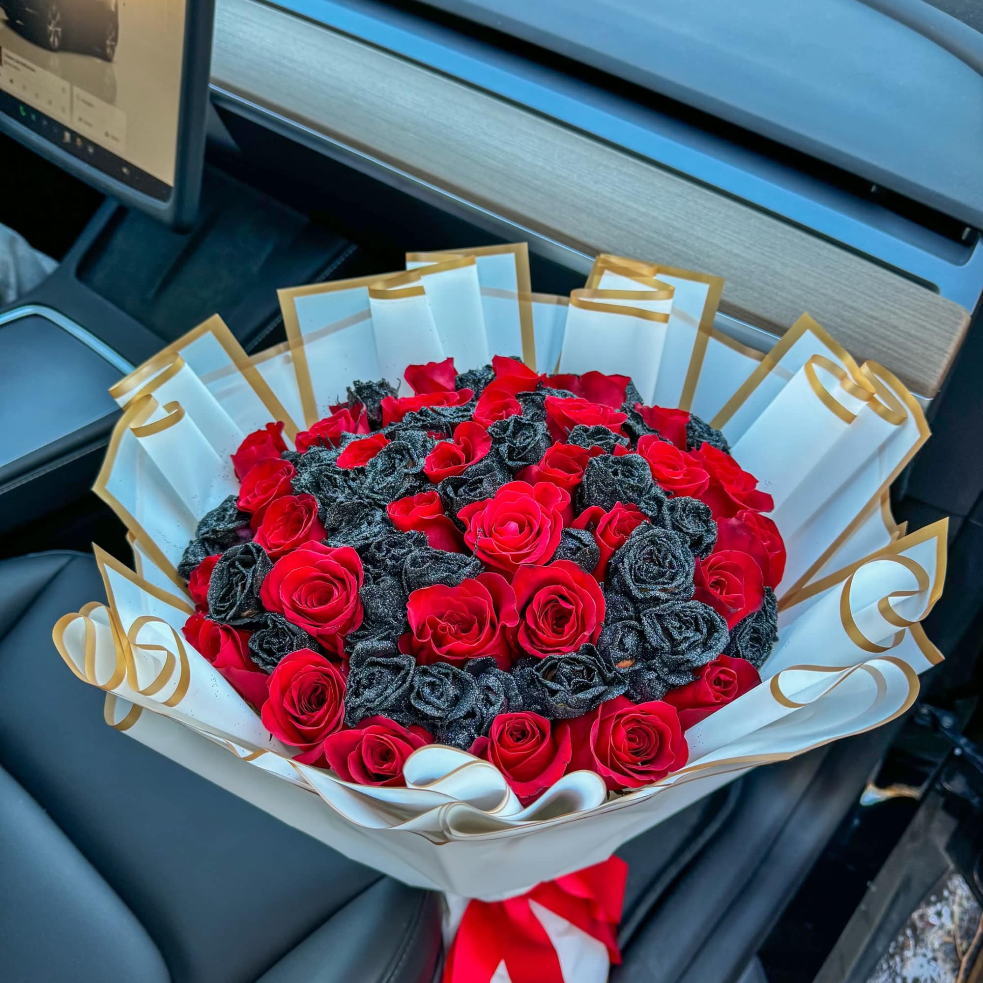 This stunning bouquet is a perfect harmony of bold 25 red roses