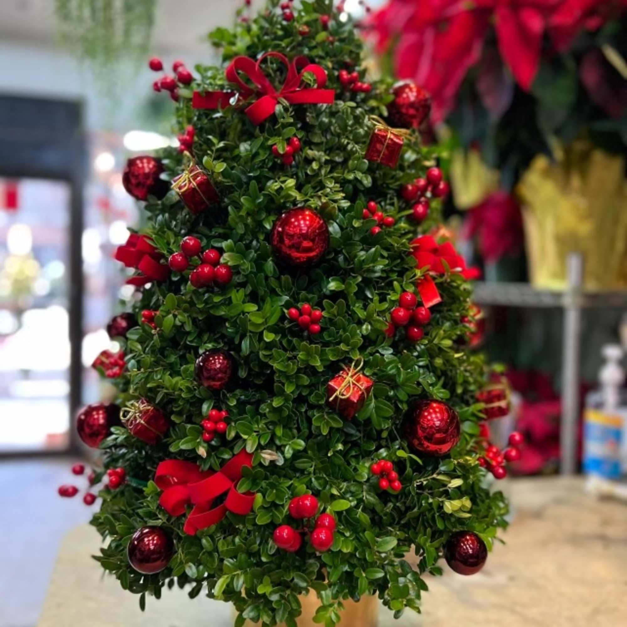 Decorated Christmas tree made of boxwood perfect for table tops.