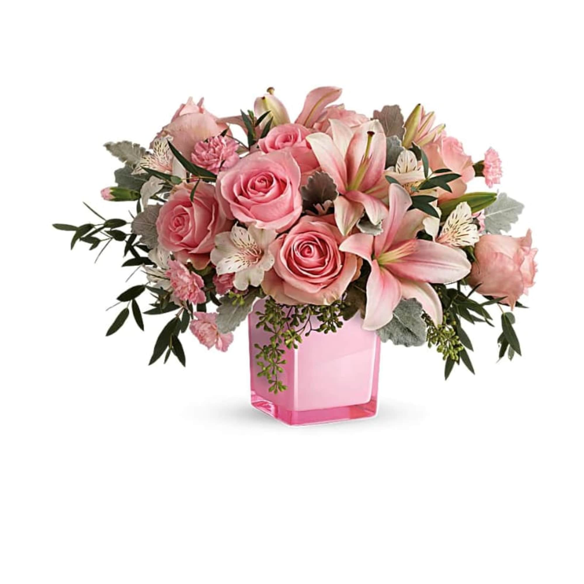 Just fabulous! From its perky pink cube and perfect pink roses, to