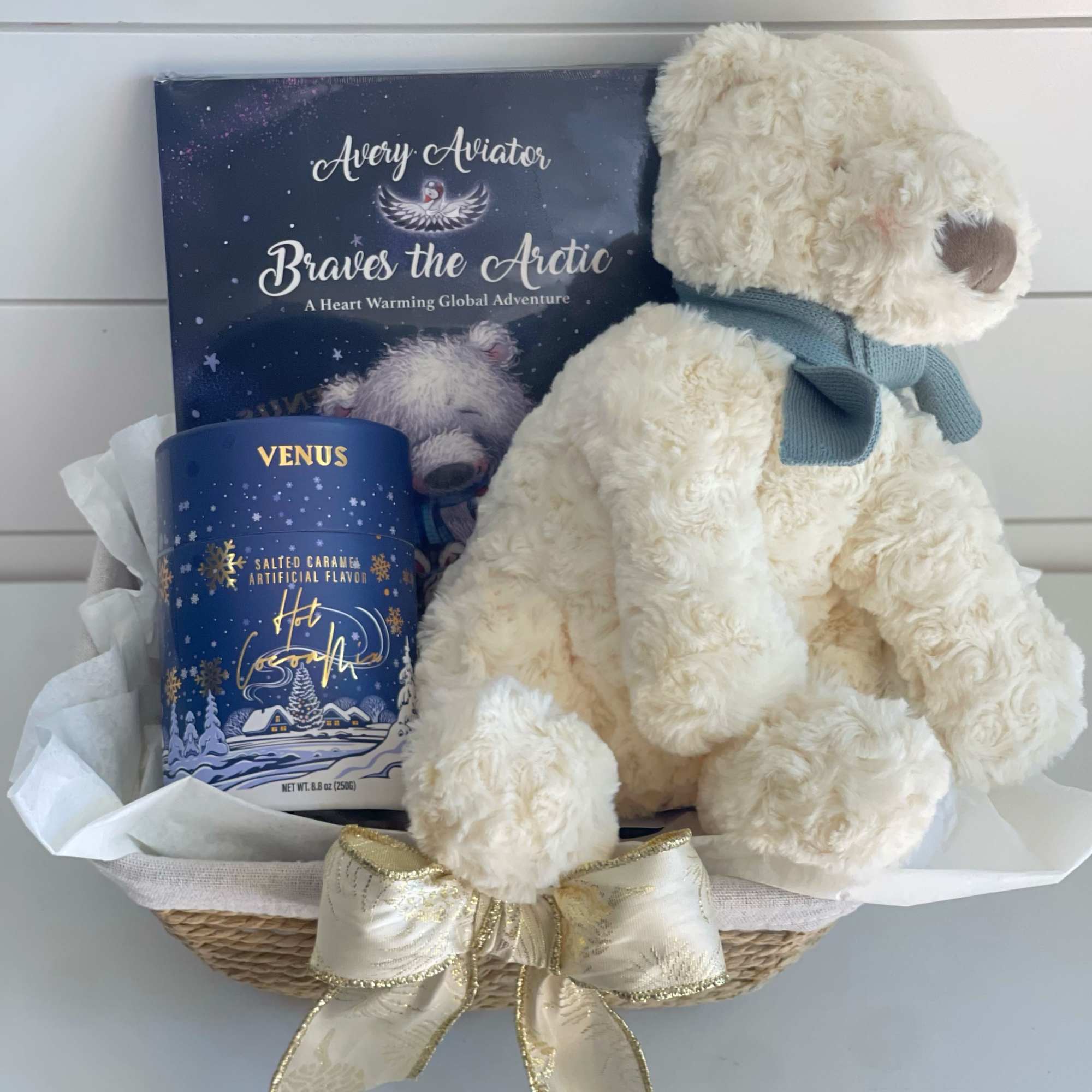 Super cute gift basket with Arctic theme. Gift basket includes:
-Avery the Aviator