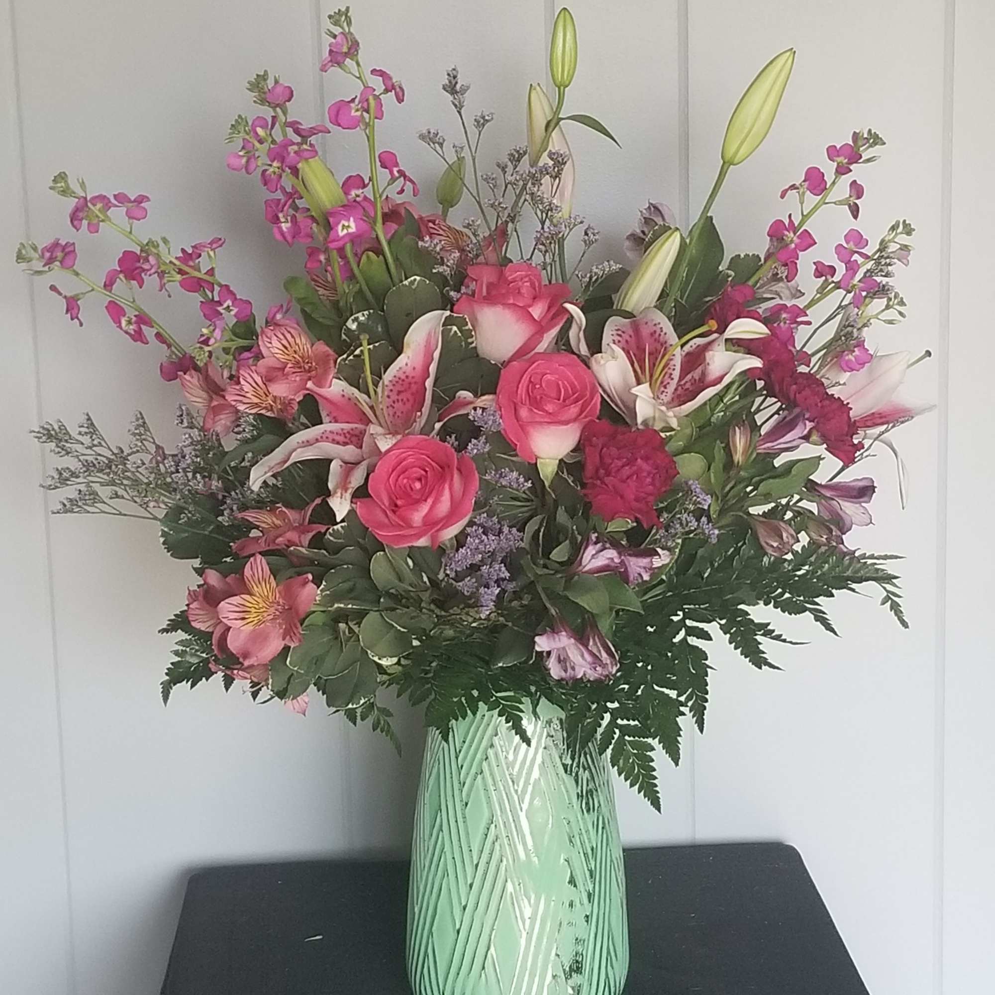 Hot pink roses mixed with Star Gazer lilies, beautiful stock, Mini Carnations