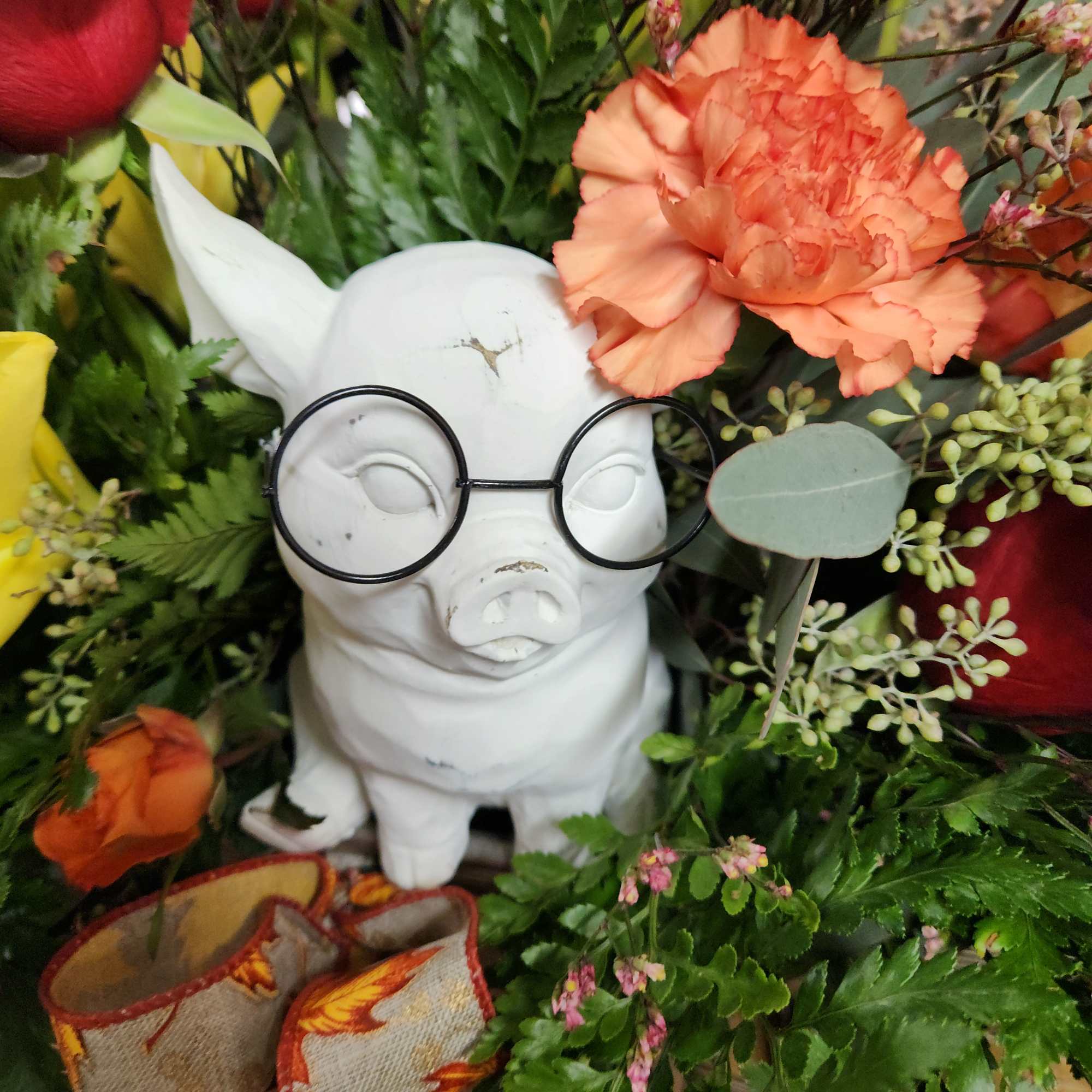 The cutest pig in a feed bunk bouquet