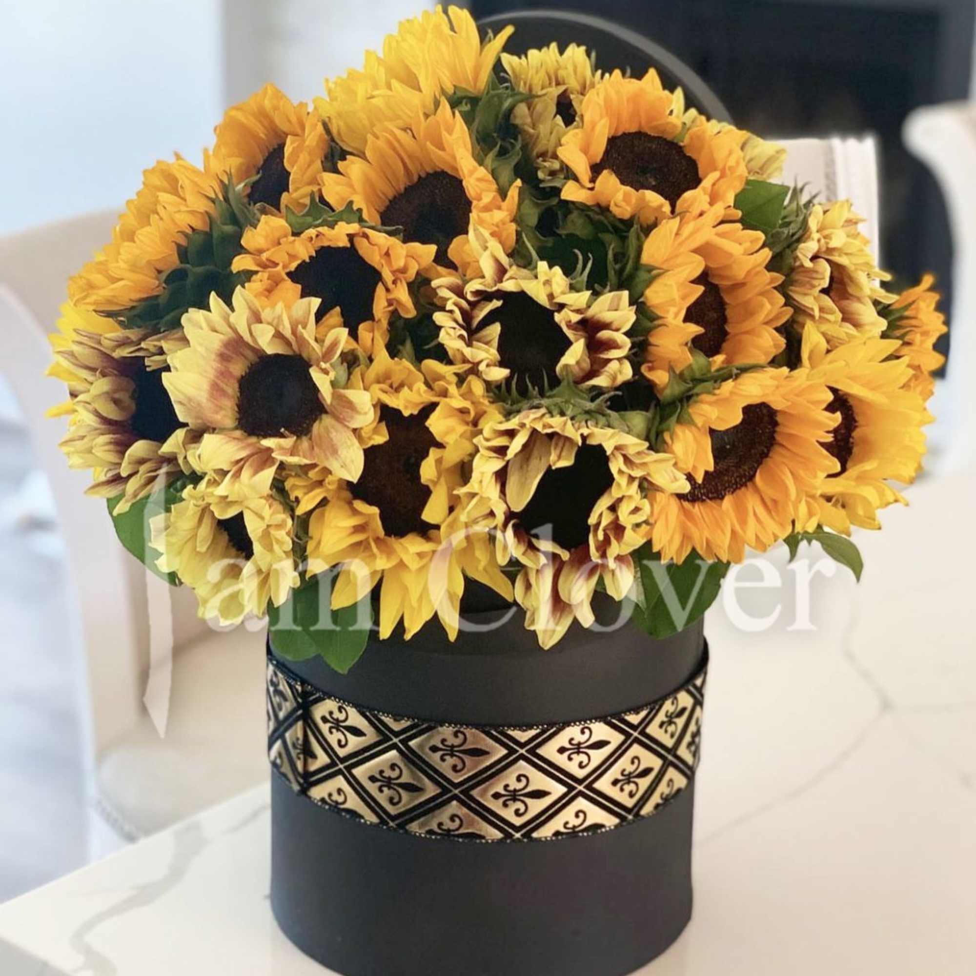 A luxury box full of sunflowers is bringing a burst of sunshine