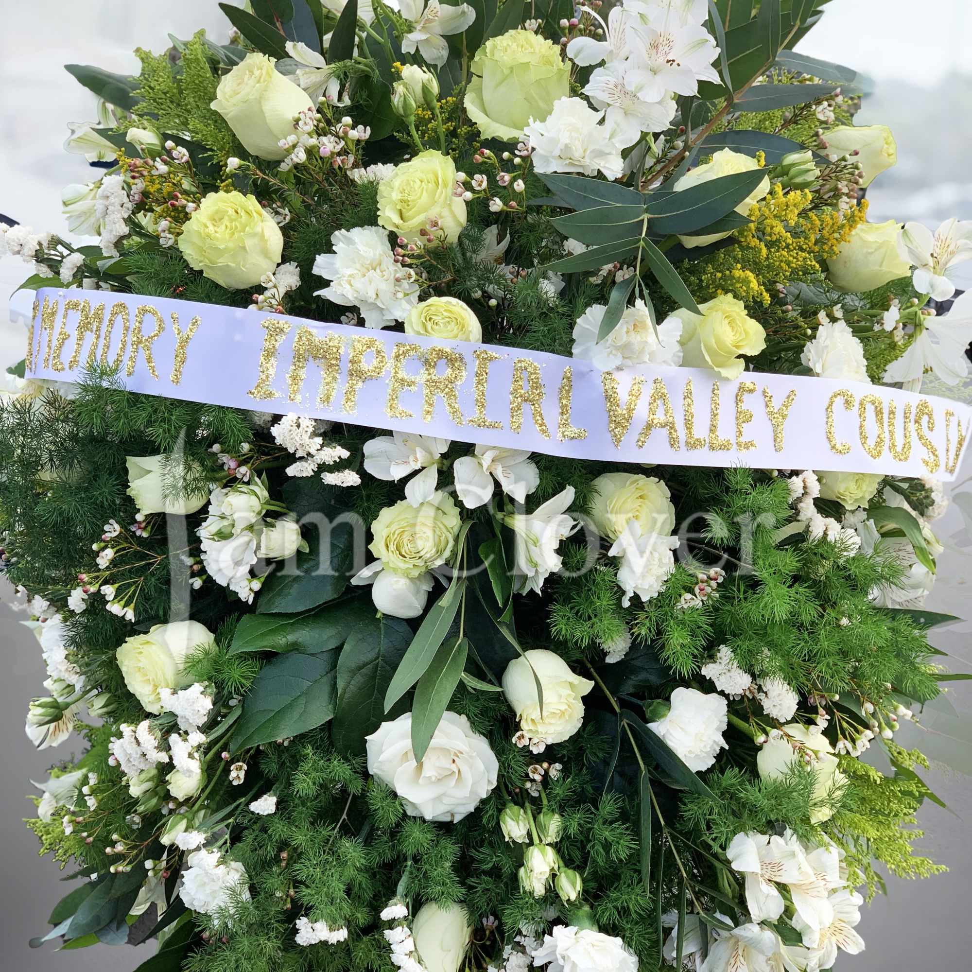 An elegant tribute! 
Sizes: Small  18-20 inch,  Medium 24-25 inch