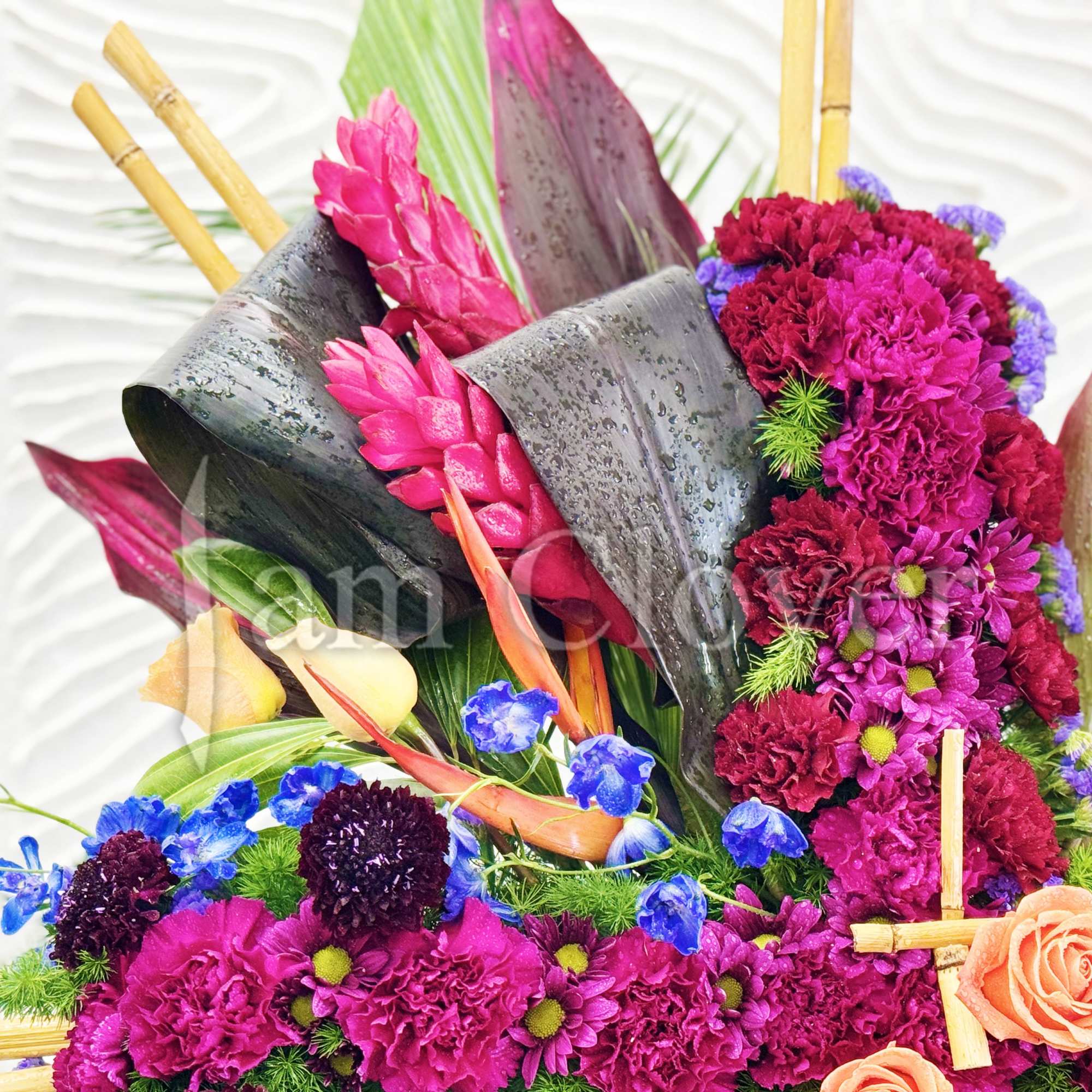 A beautiful tropical flower standing cross is a vibrant and striking tribute.
Fulfill