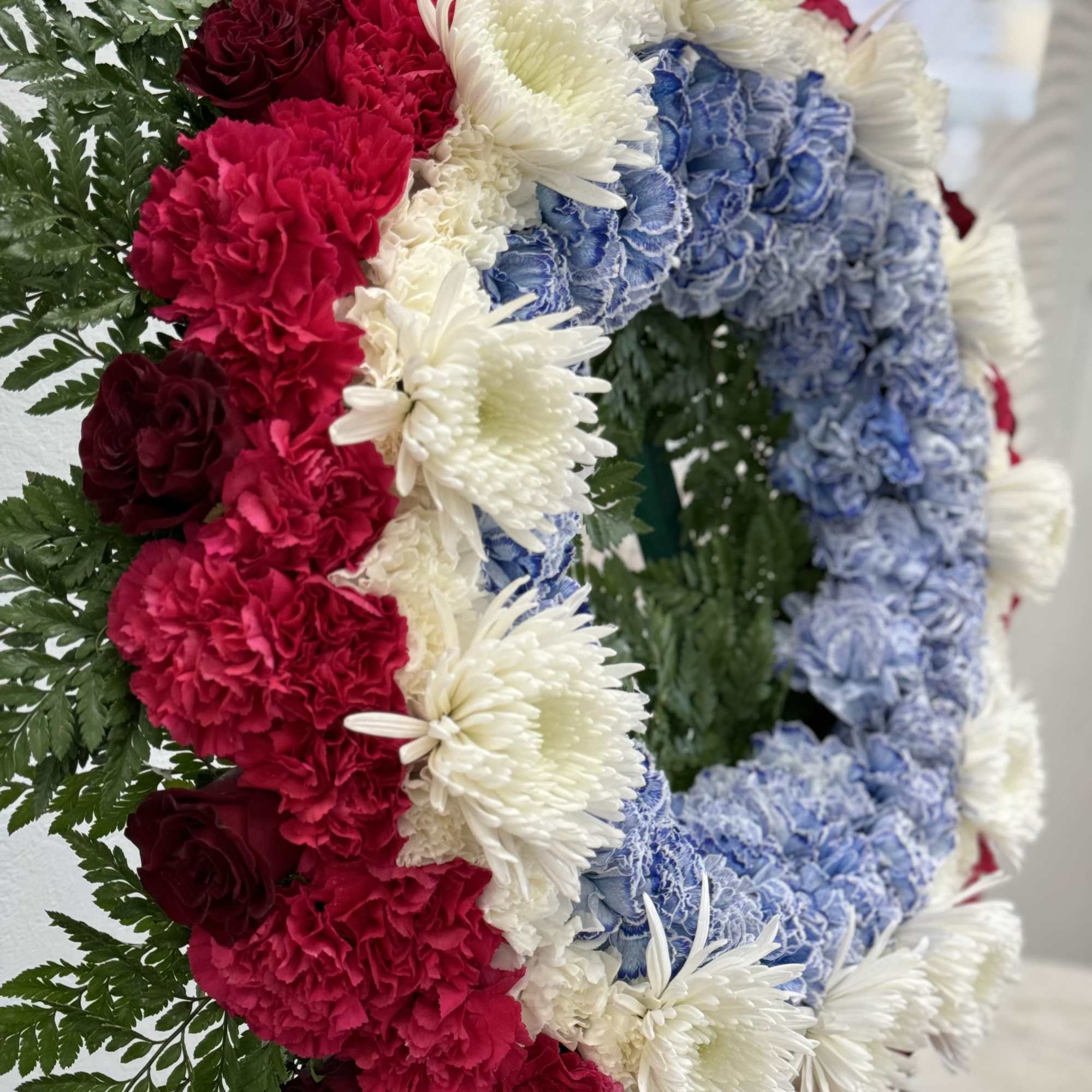 Patriotic Standing Wreath
A tasteful and elegant funeral arrangement that honors your loved
