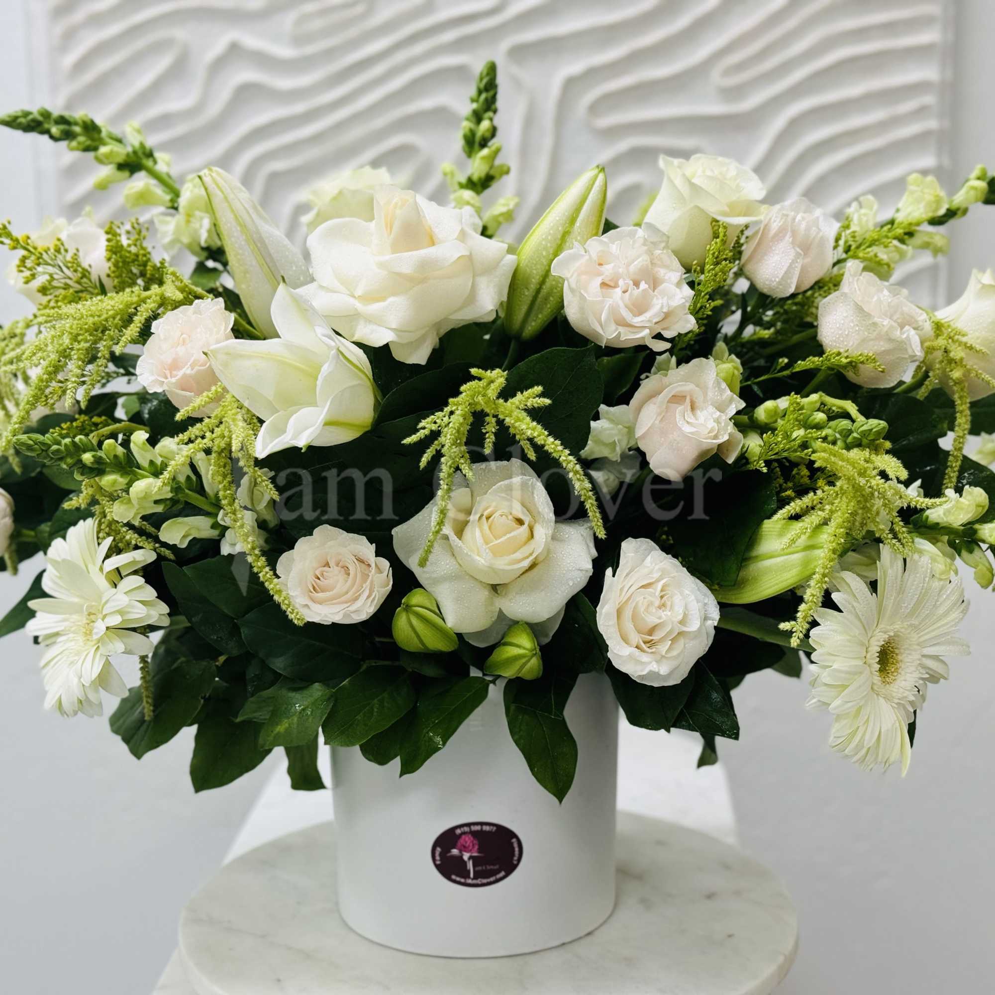 A beautiful modern and elegant arrangement. 

Fulfill your floral needs at I