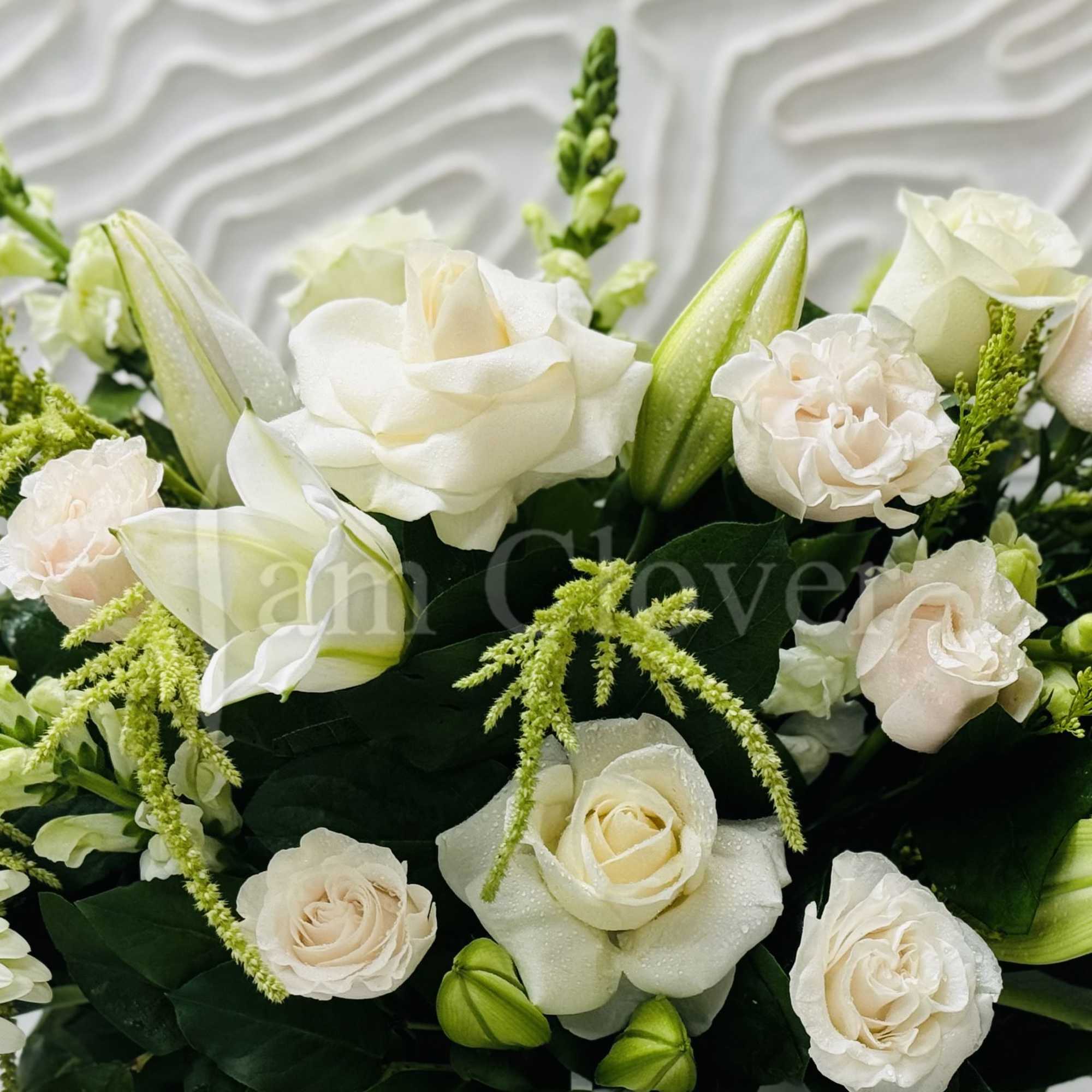 A beautiful modern and elegant arrangement. 

Fulfill your floral needs at I