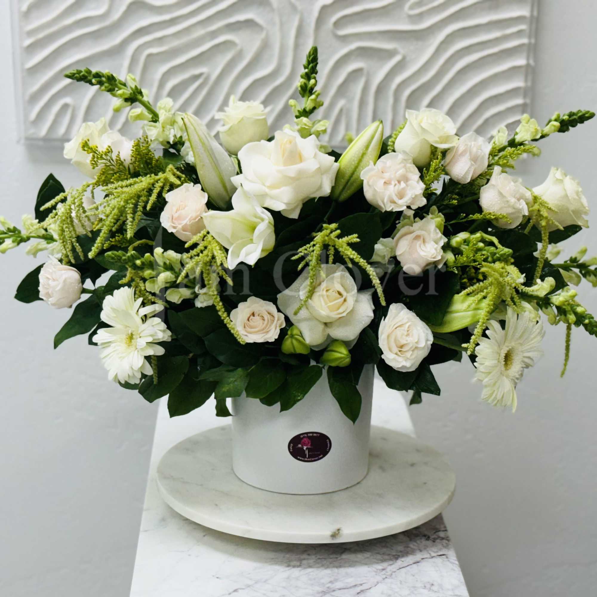 A beautiful modern and elegant arrangement. 

Fulfill your floral needs at I