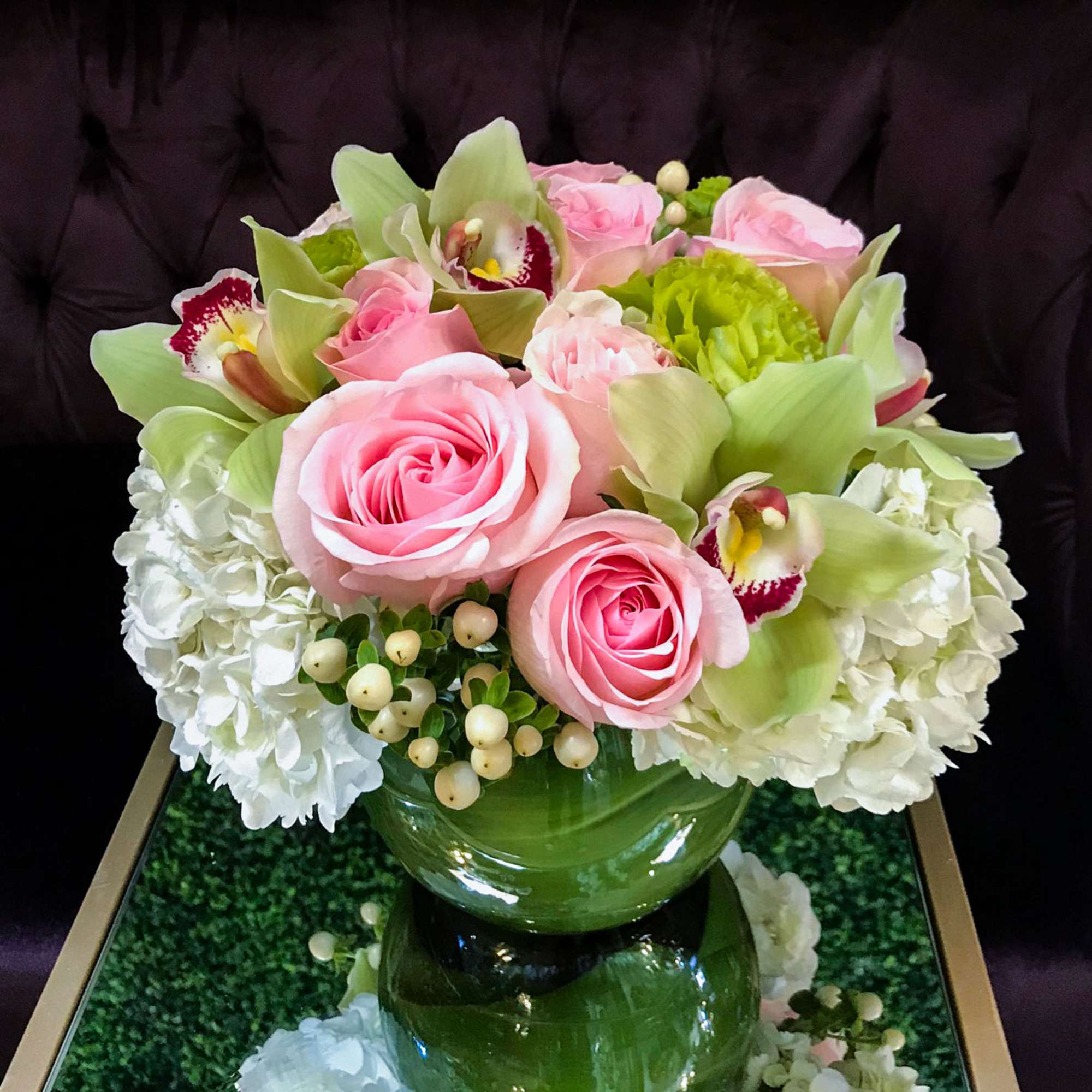 Impress your special someone with this collection of white hydrangeas, pink roses