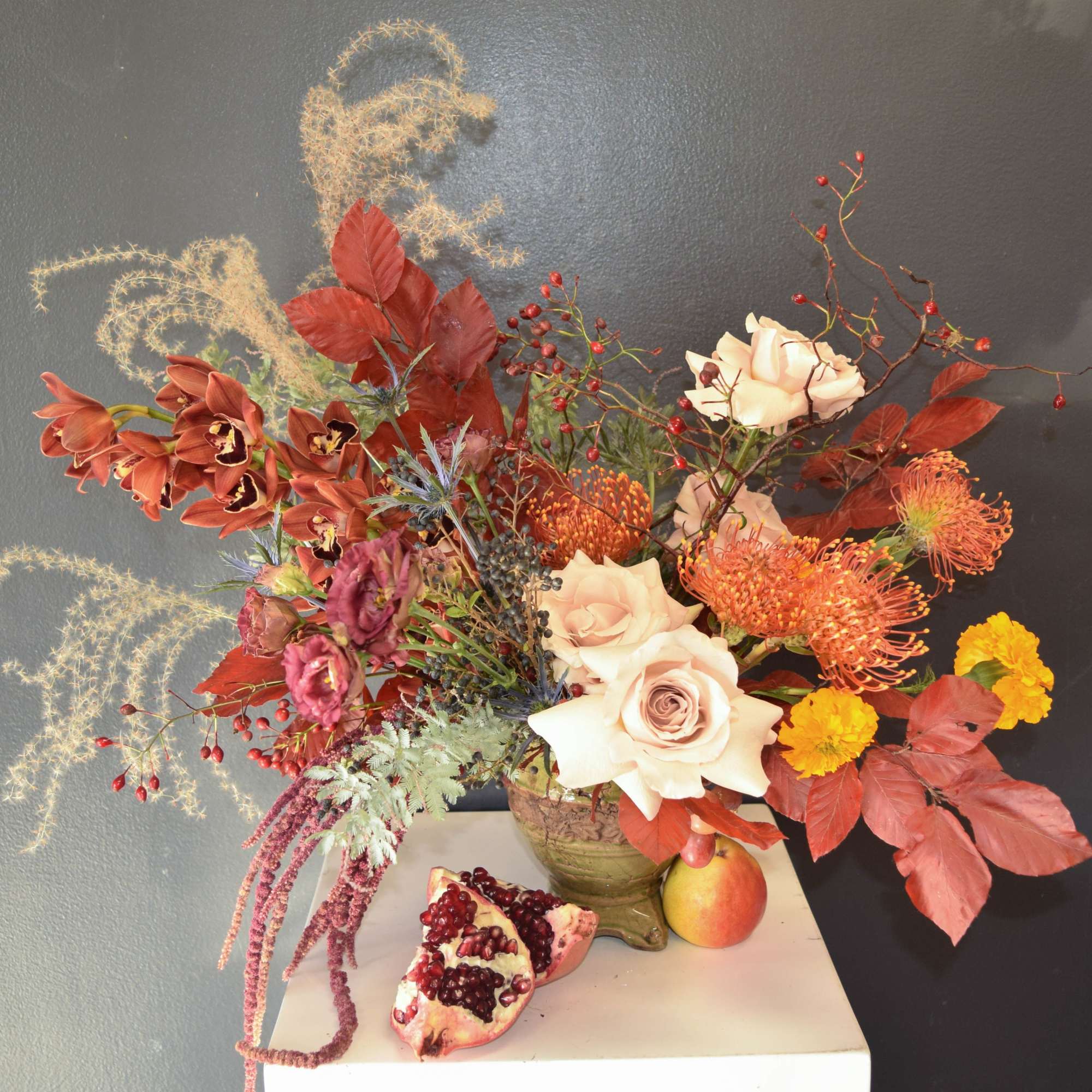 A true showstopper, this large arrangement is brimming with seasonal beauty ready
