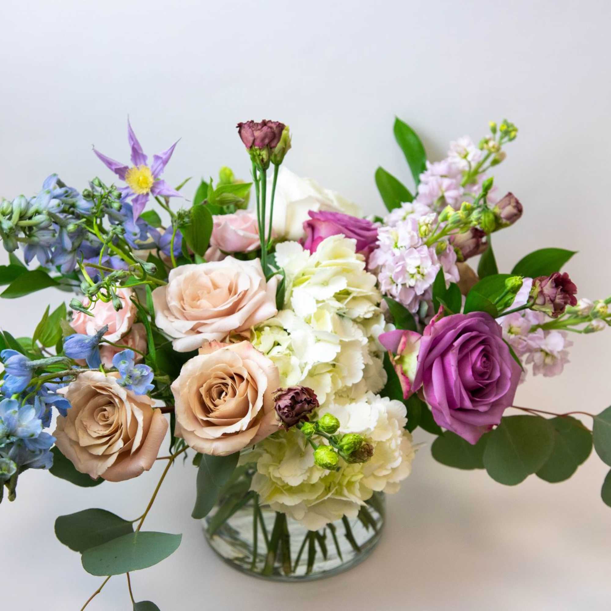 A stunning statement centerpiece! These pastel blooms feel like a breath of