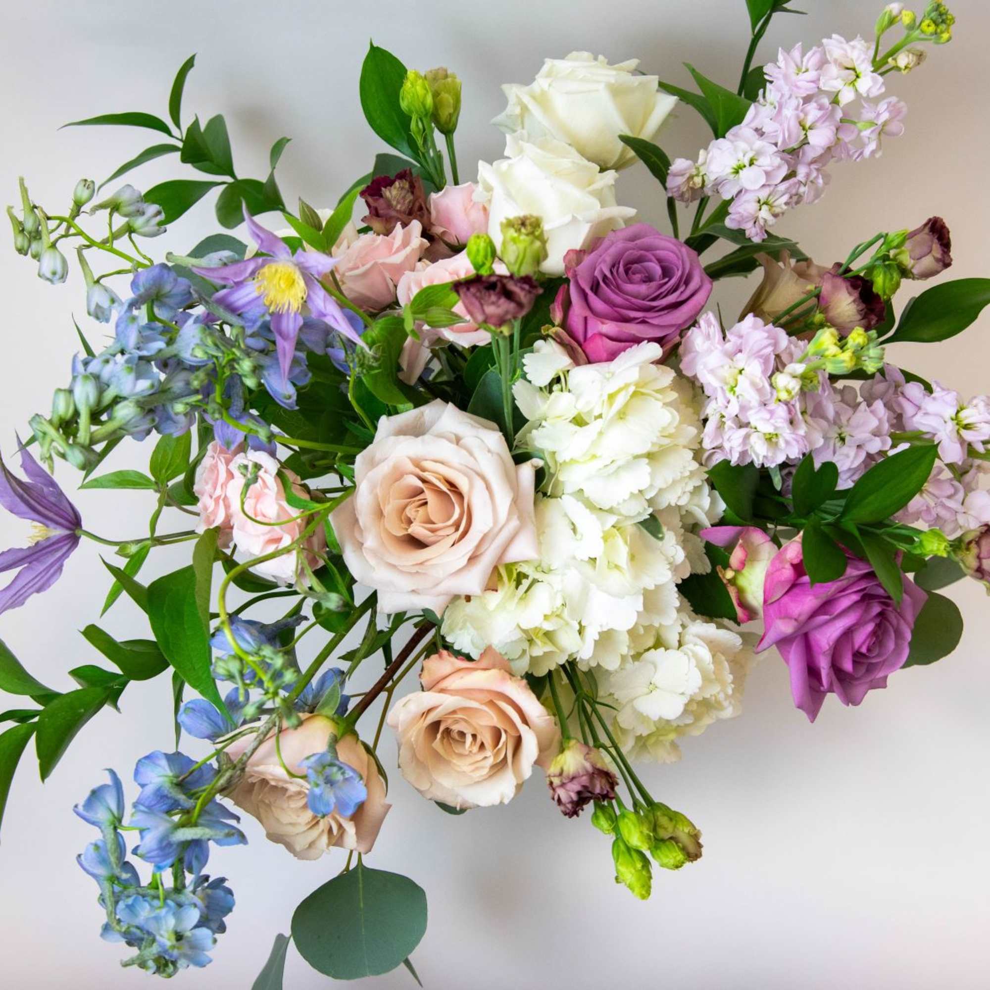 A stunning statement centerpiece! These pastel blooms feel like a breath of