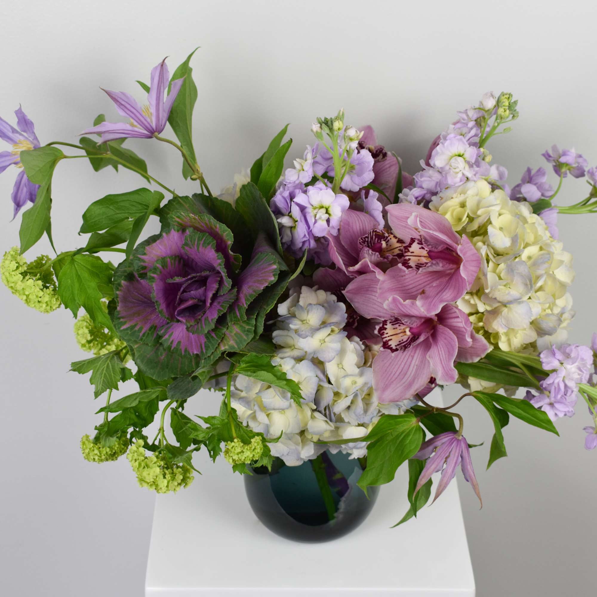 Mysterious, effervescent, beautiful...this white, purple and blue creation is sure to entrance