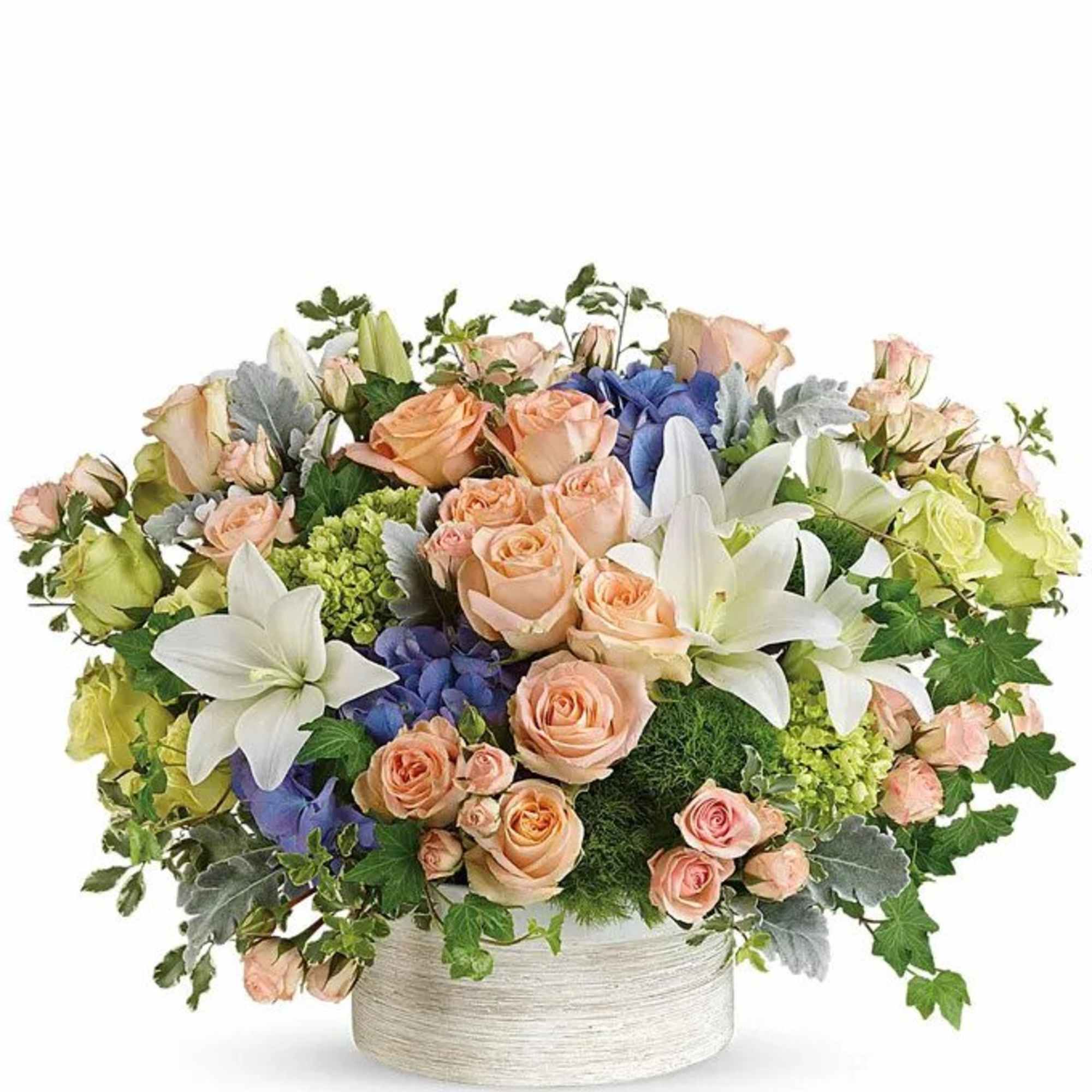 This untamed garden of green and peach is wildly chic. Beautiful and