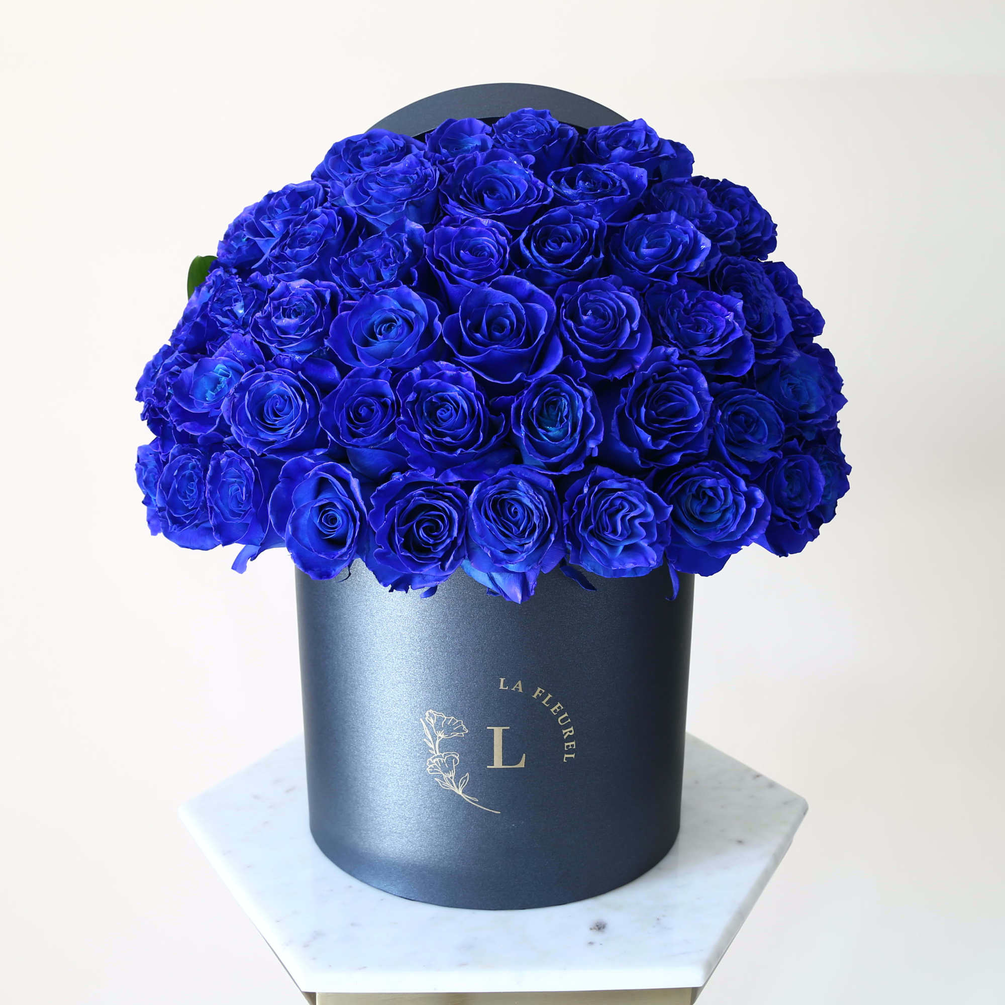 This beautiful arrangement filled with the royal blue roses to deliver your
