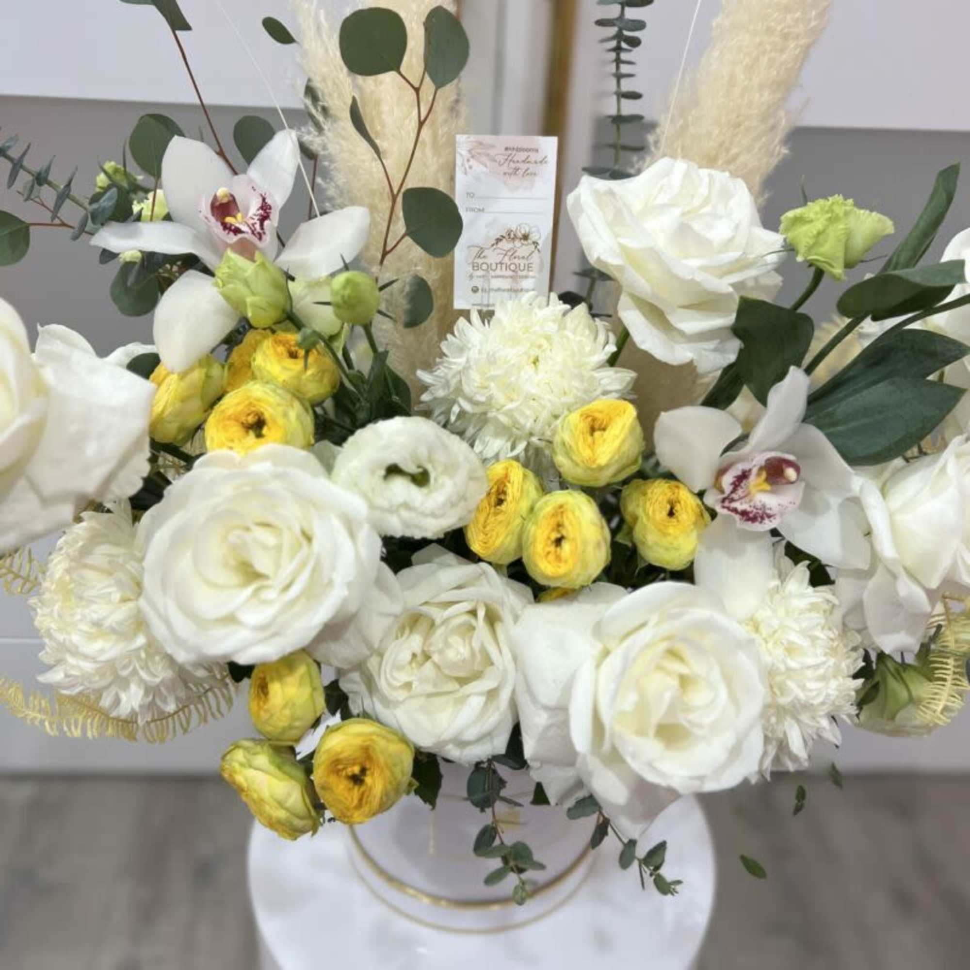 Floral Box with an assortment of premium premium roses, orchids, eucalyptus, pampas