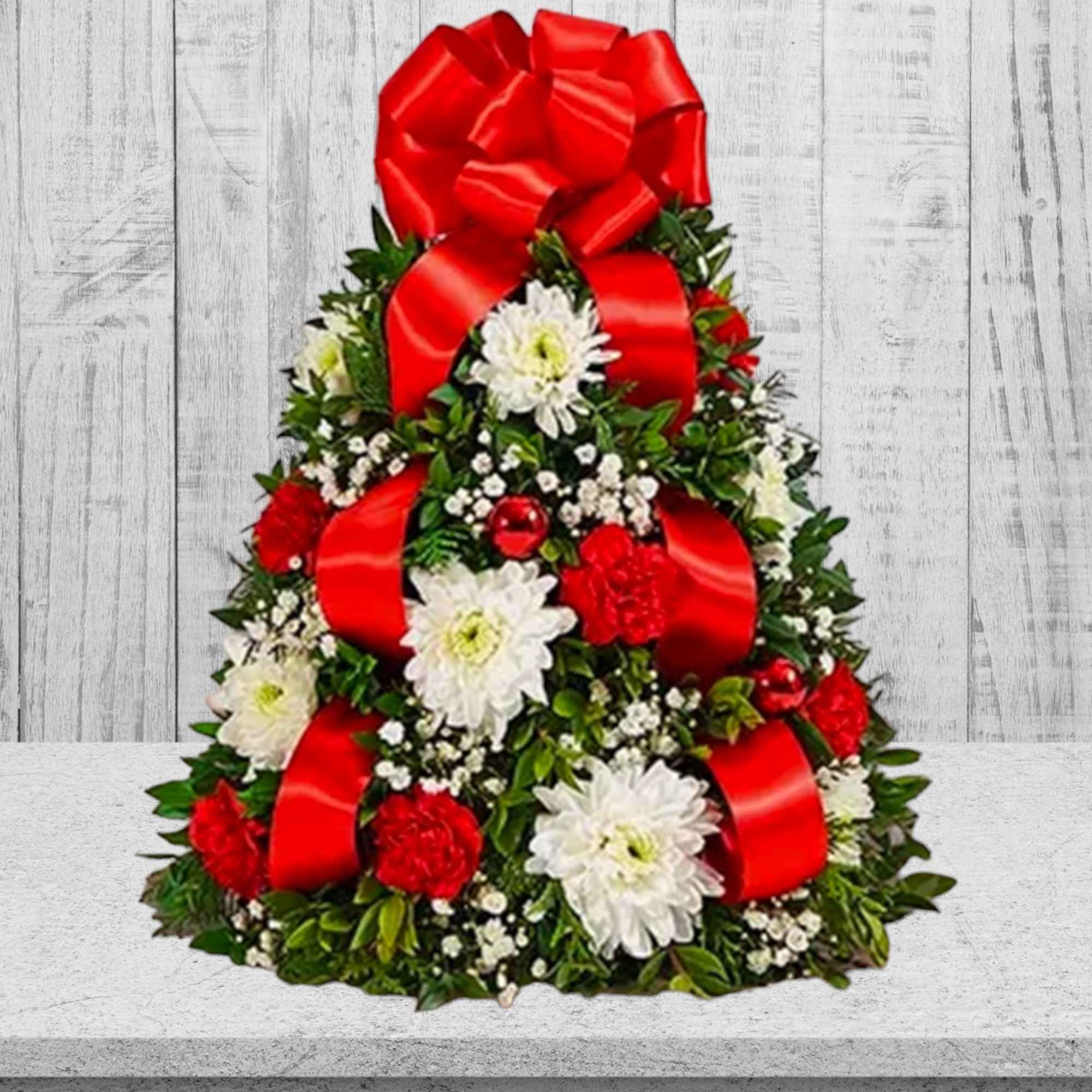The holiday favorite that started it all! Our flower tree arrangement is