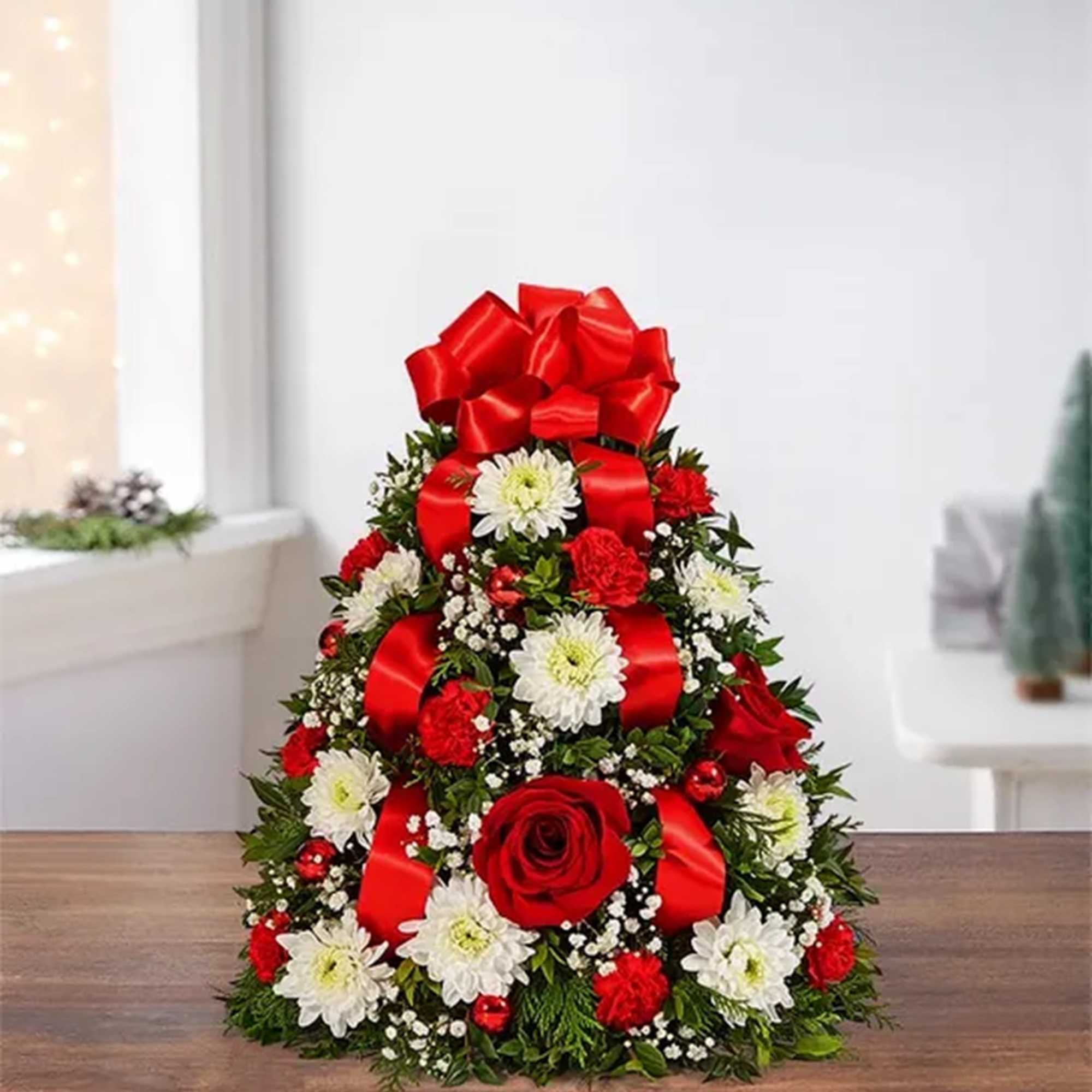 The holiday favorite that started it all! Our flower tree arrangement is
