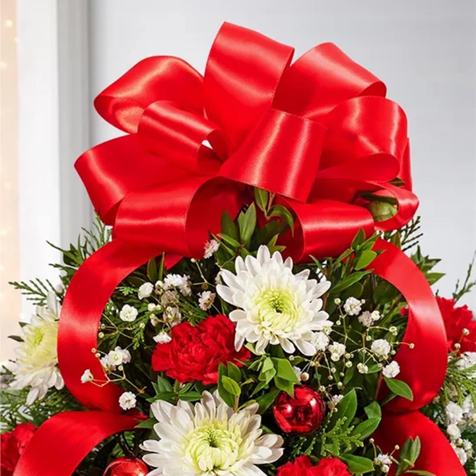 The holiday favorite that started it all! Our flower tree luxury arrangement