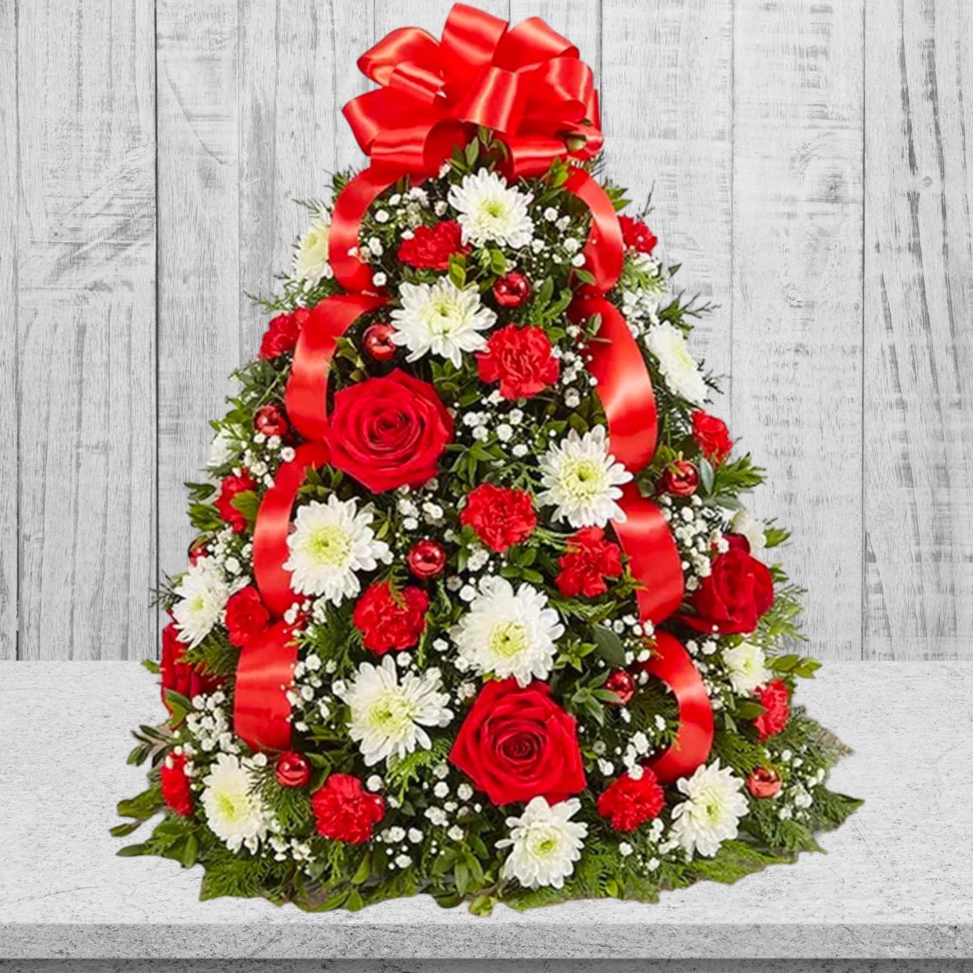 The holiday favorite that started it all! Our flower tree luxury arrangement