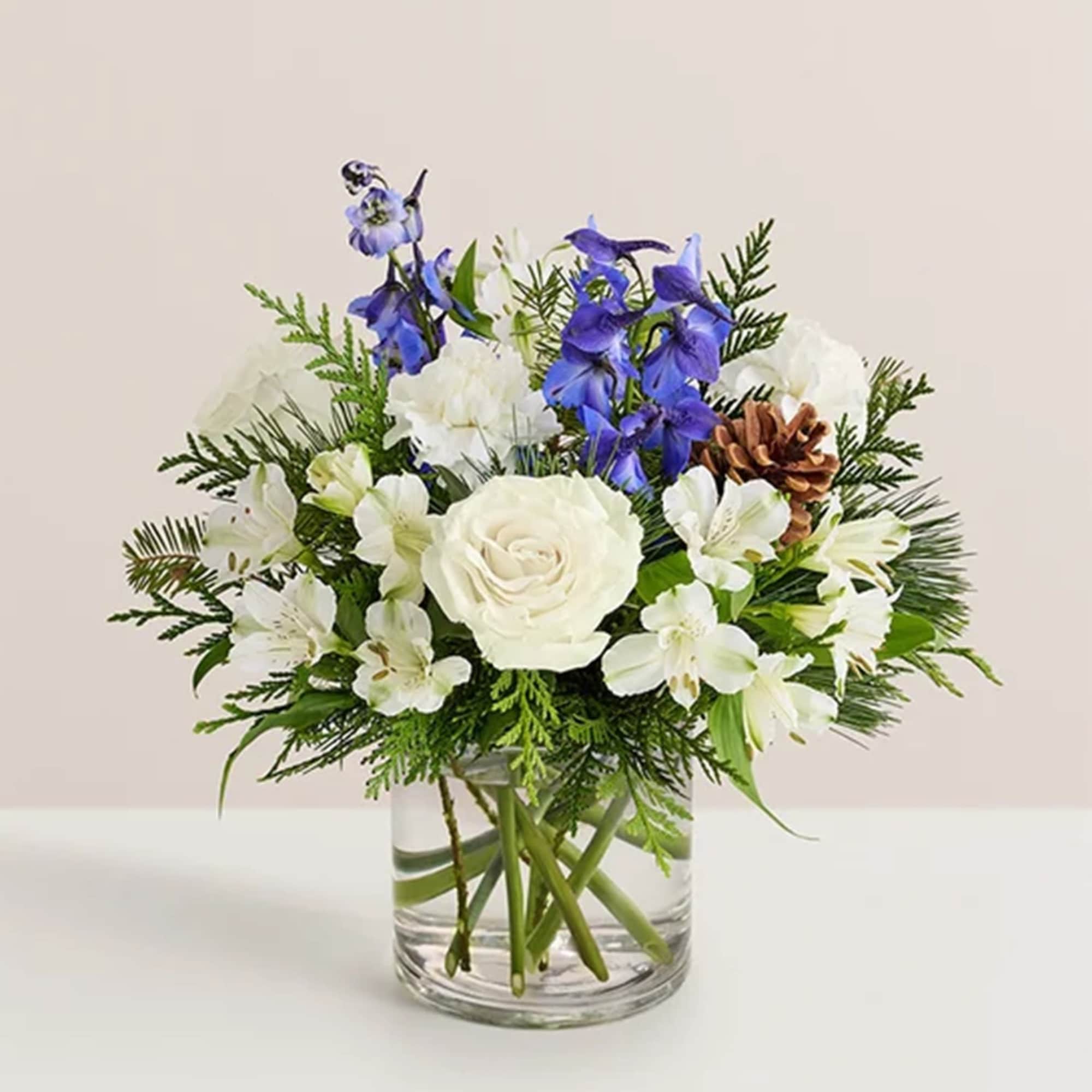 Inspired by winter&rsquo;s cool blue &amp; white landscape, our delightful arrangement delivers