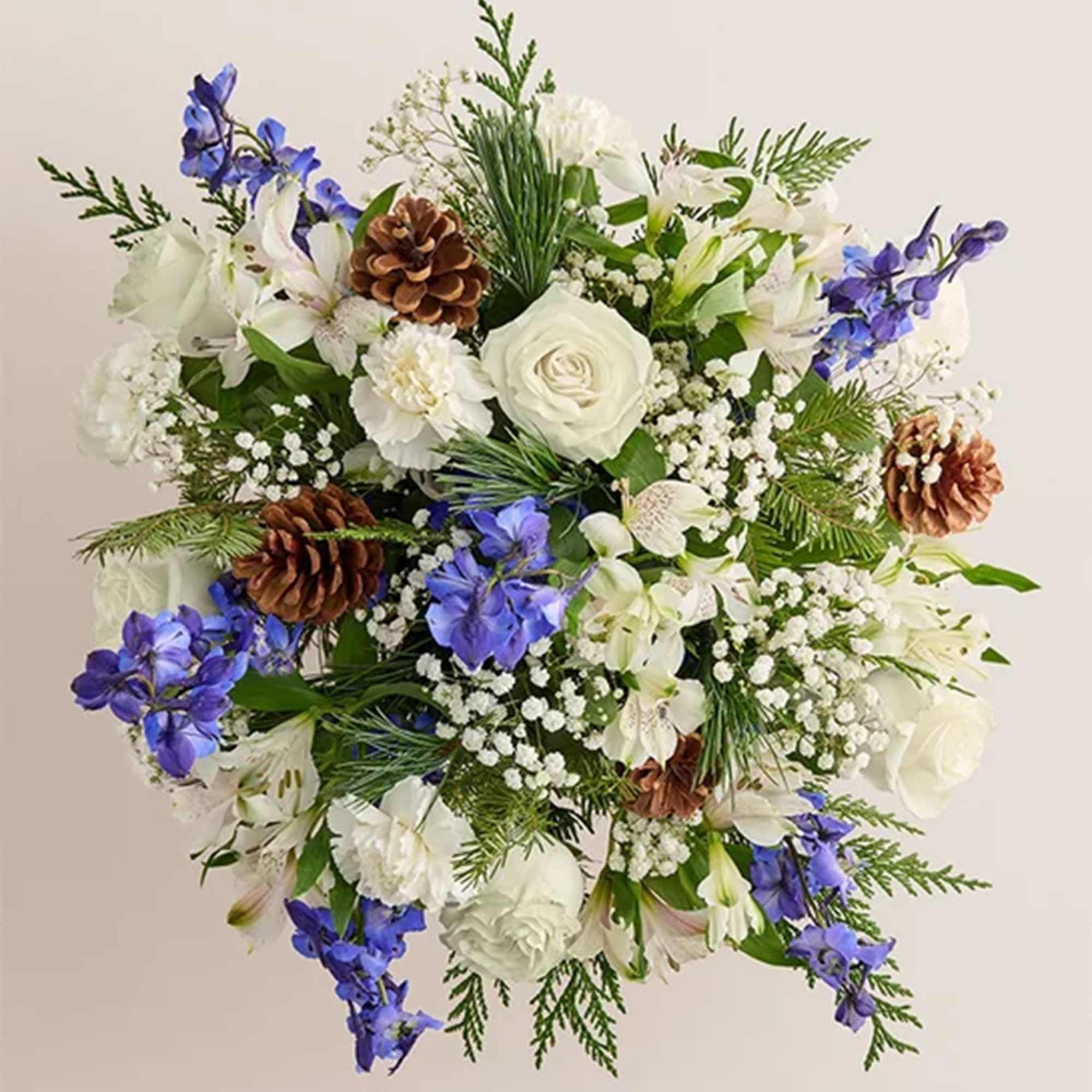 Inspired by winter&rsquo;s cool blue &amp; white landscape, our delightful arrangement delivers