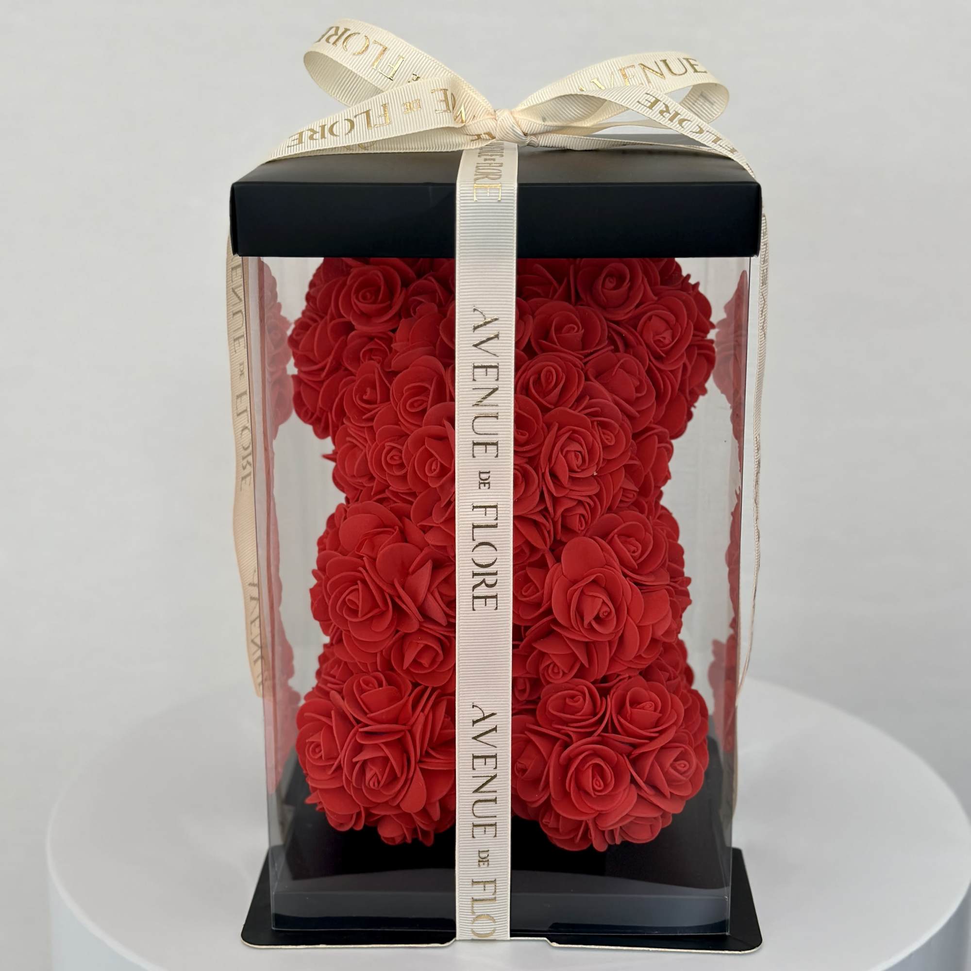 Meet our adorable Red Rose Bear, a cuddly companion infused with the