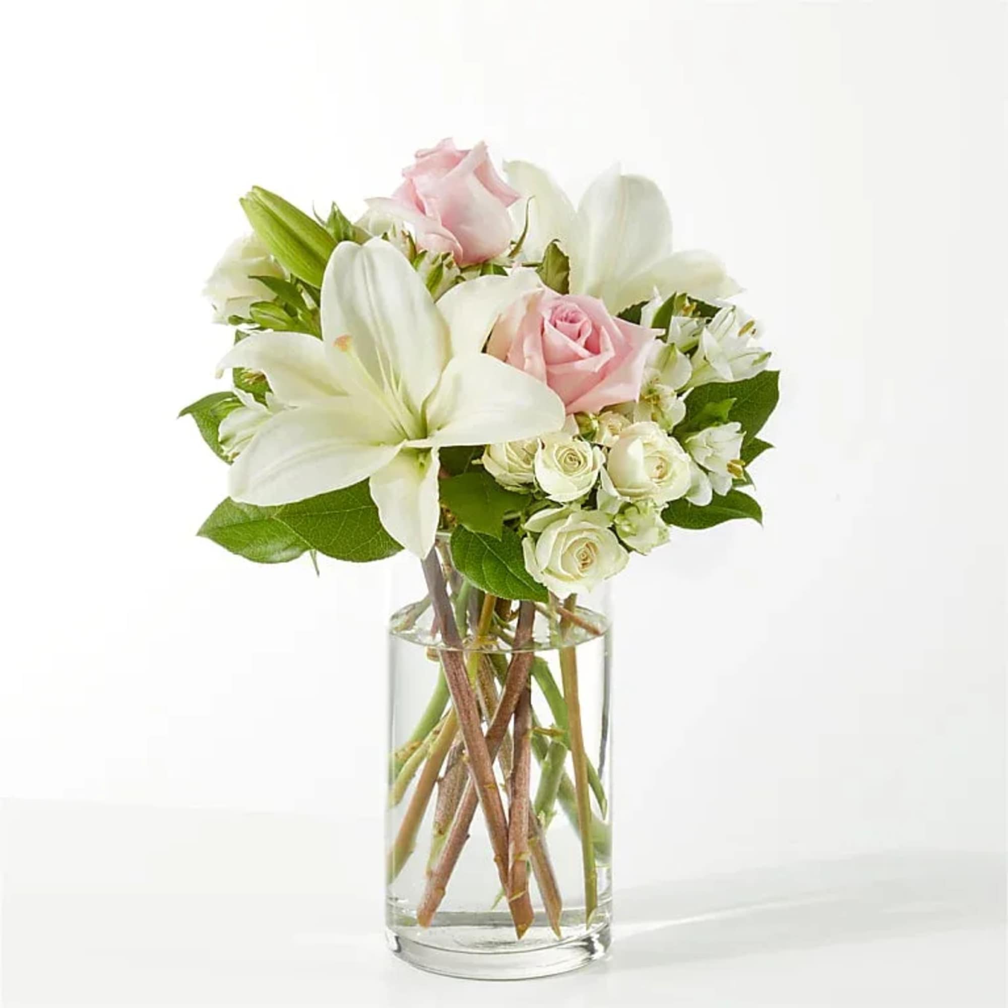 The Kindhearted bouquet is a gentle swirl of pale pink and ivory