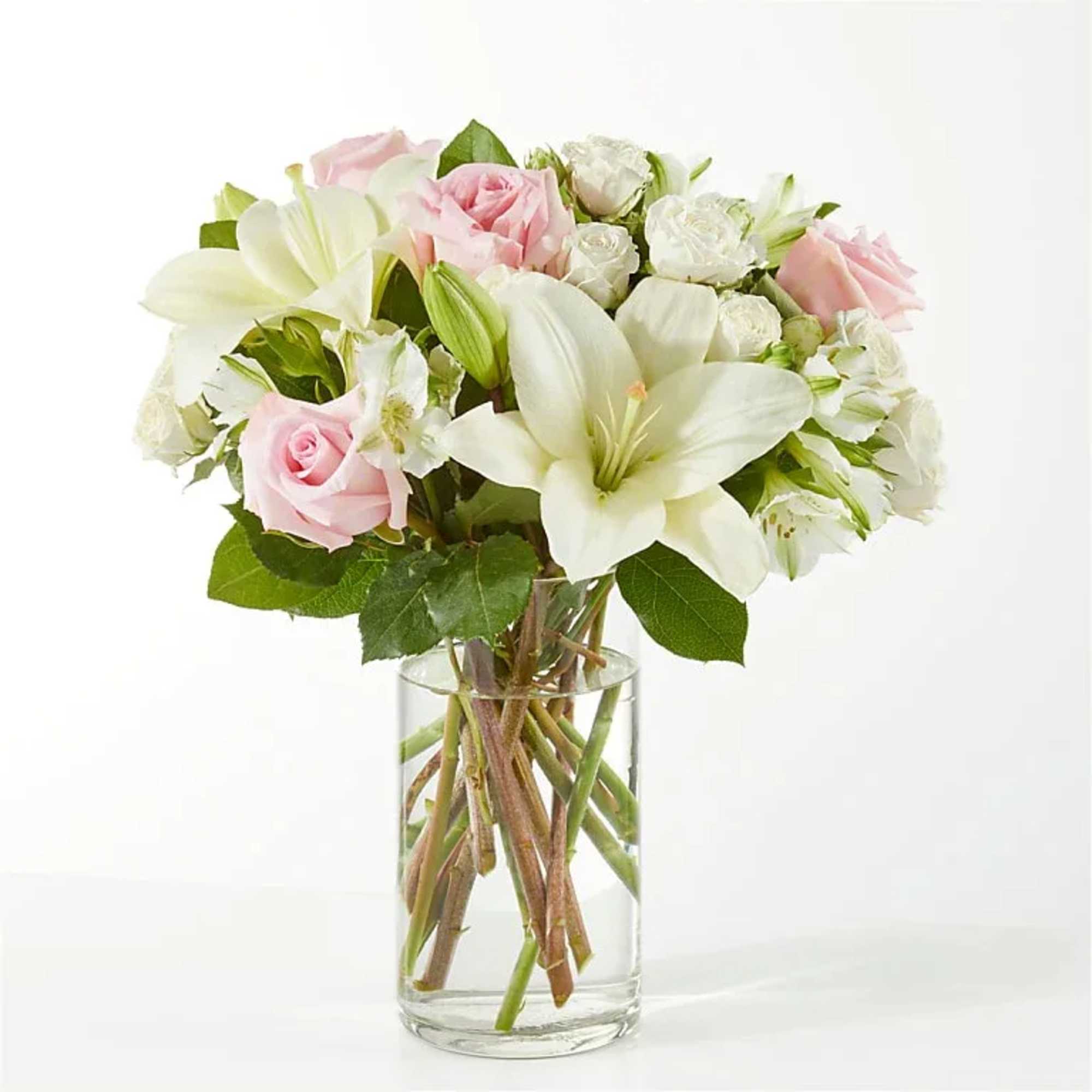 The Kindhearted bouquet is a gentle swirl of pale pink and ivory