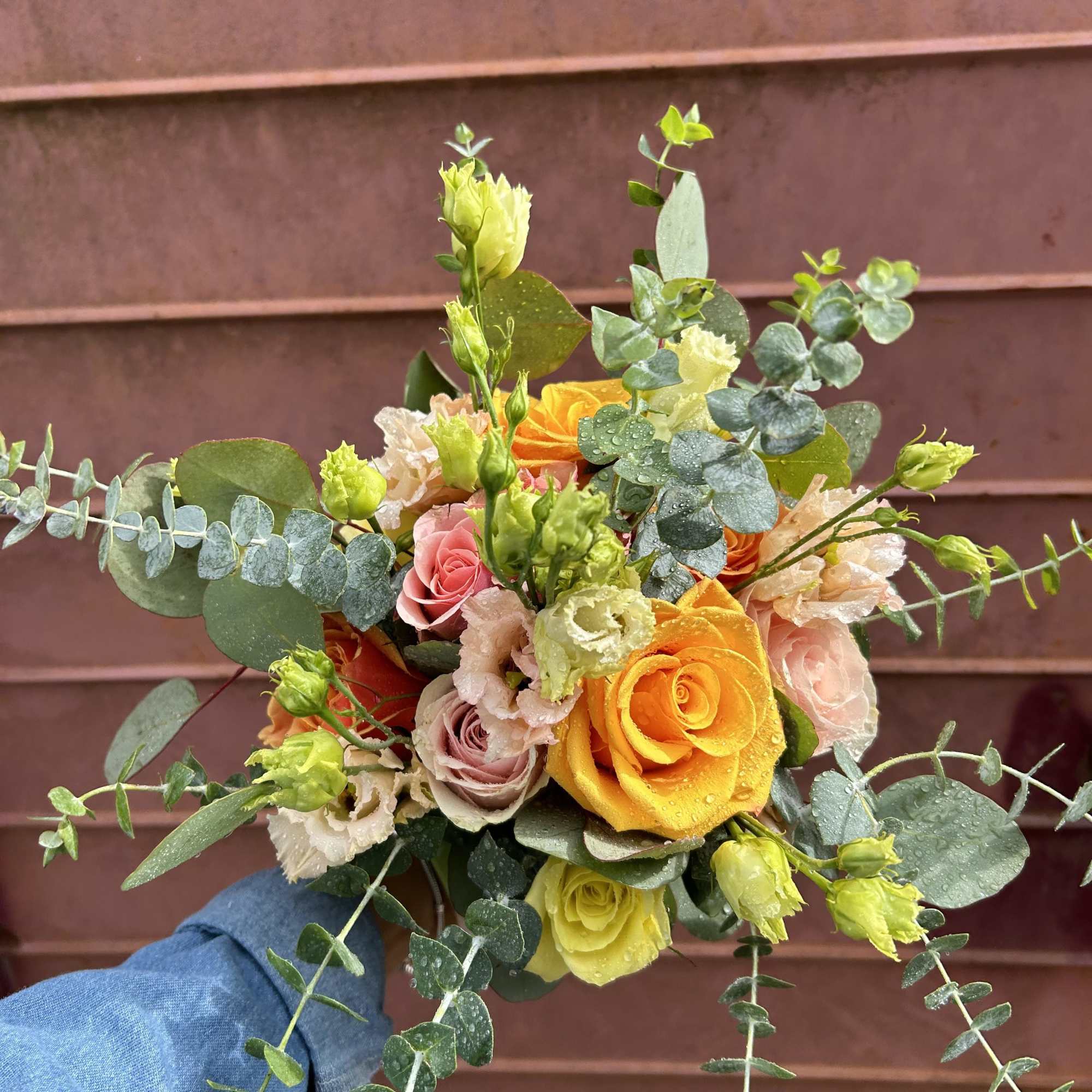 Multicolor roses, lisianthus, eucalyptus, 