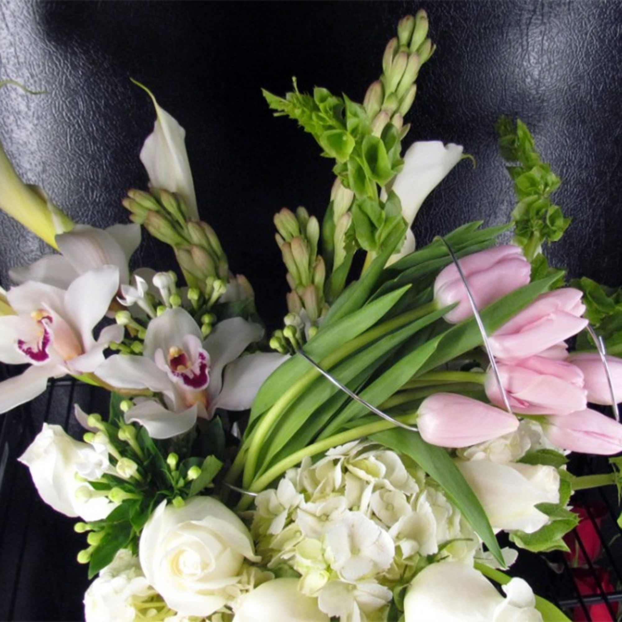 This gorgeous floral arrangement was created for one of our friends and