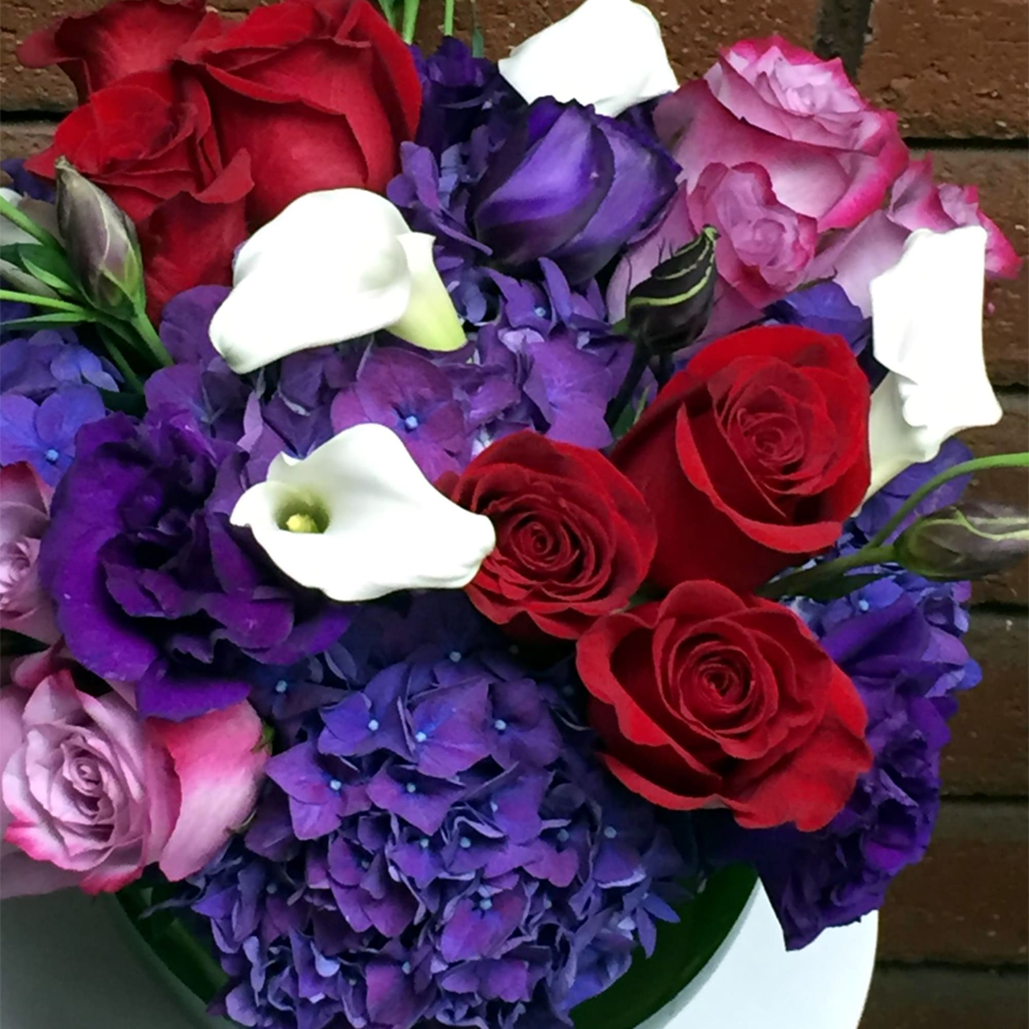 There&#039;s hardly a message or wish that a purple floral arrangement doesn&#039;t