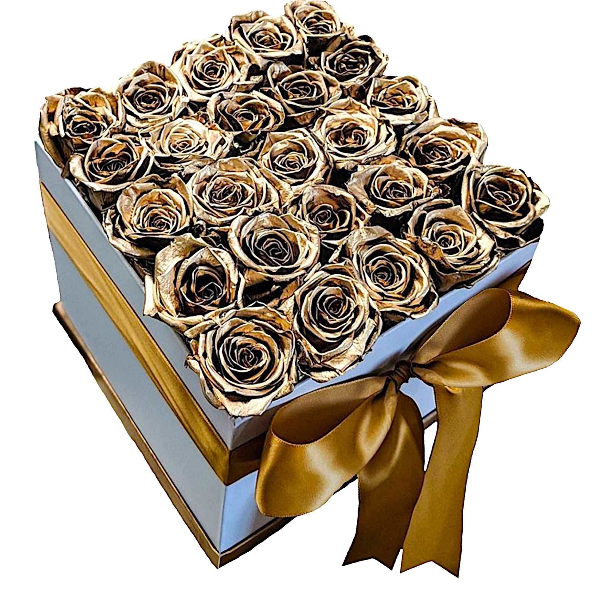 A modern flower arrangement in a white box filled with gold painted