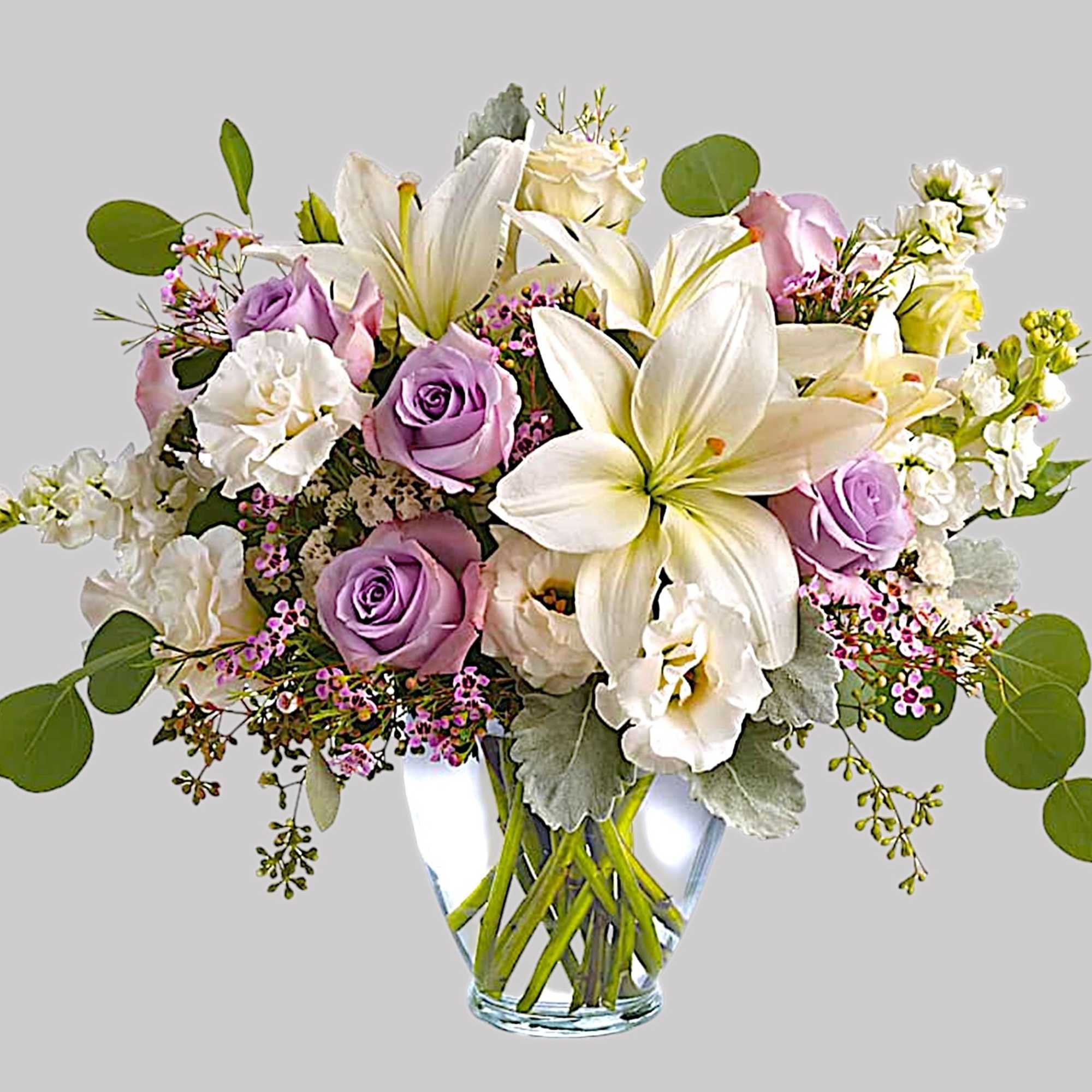 Luxe in love! Pale lavender roses, creamy white lilies and delicate greens