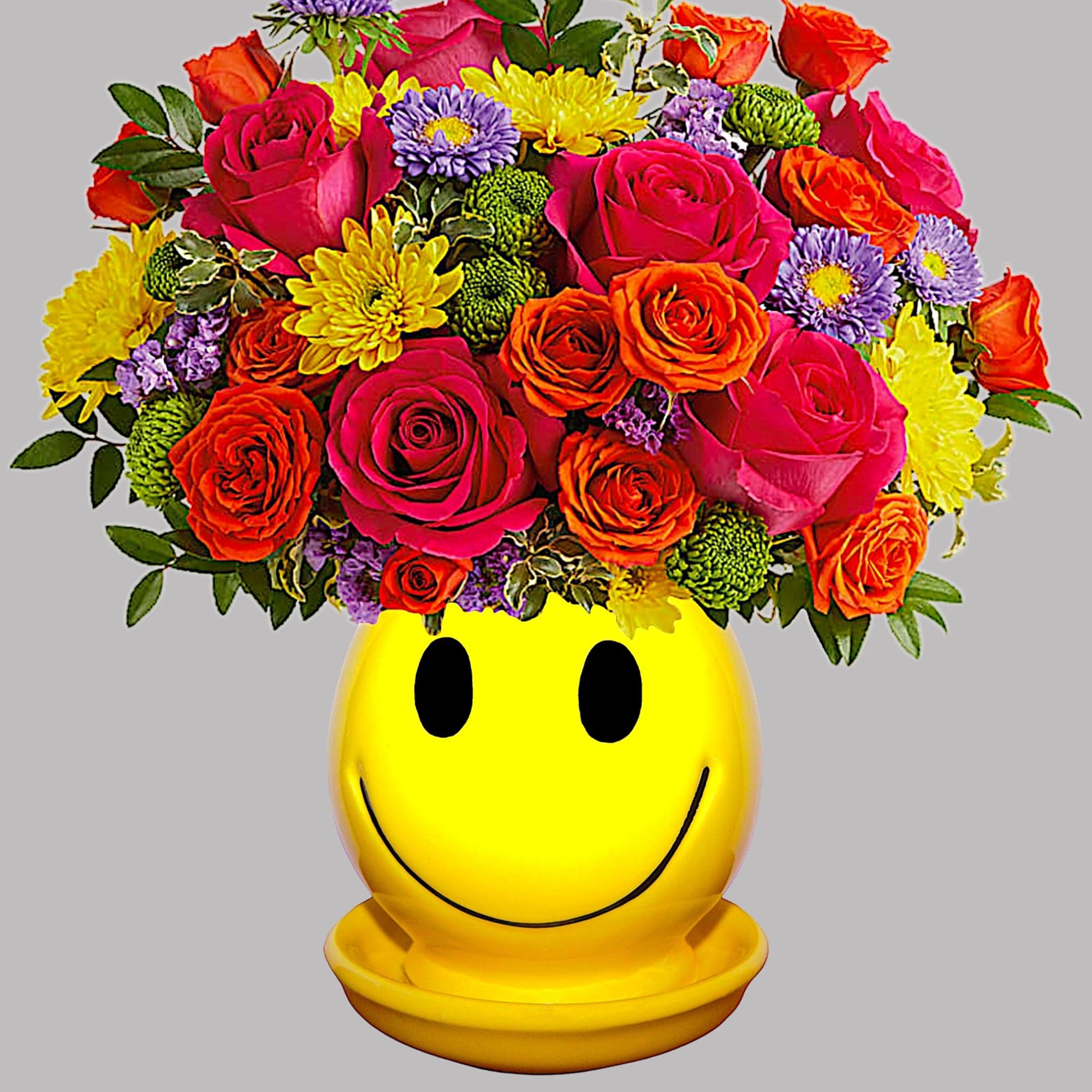 Happiness, delivered! Colorful roses in a cheerful ceramic planter are the quickest