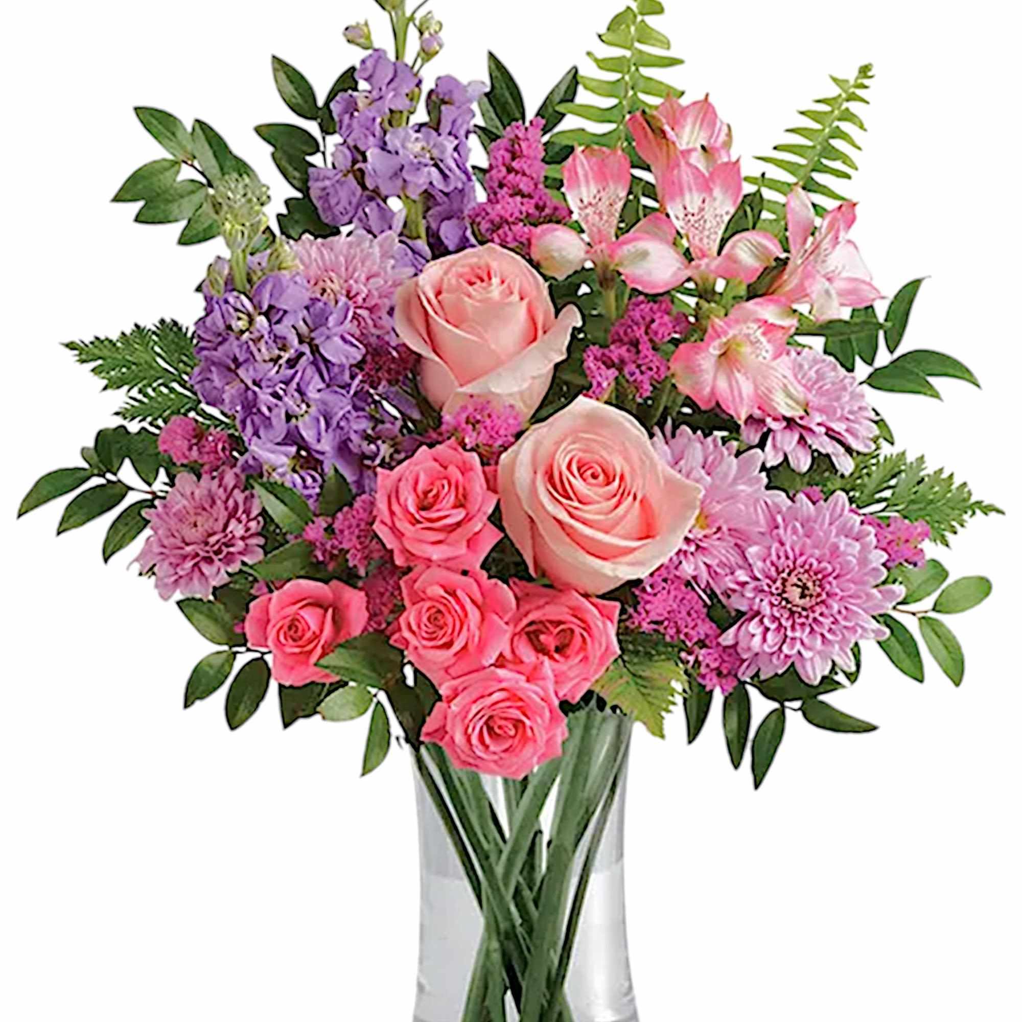Soft pink roses breathe life into this perfectly feminine arrangement. This charming