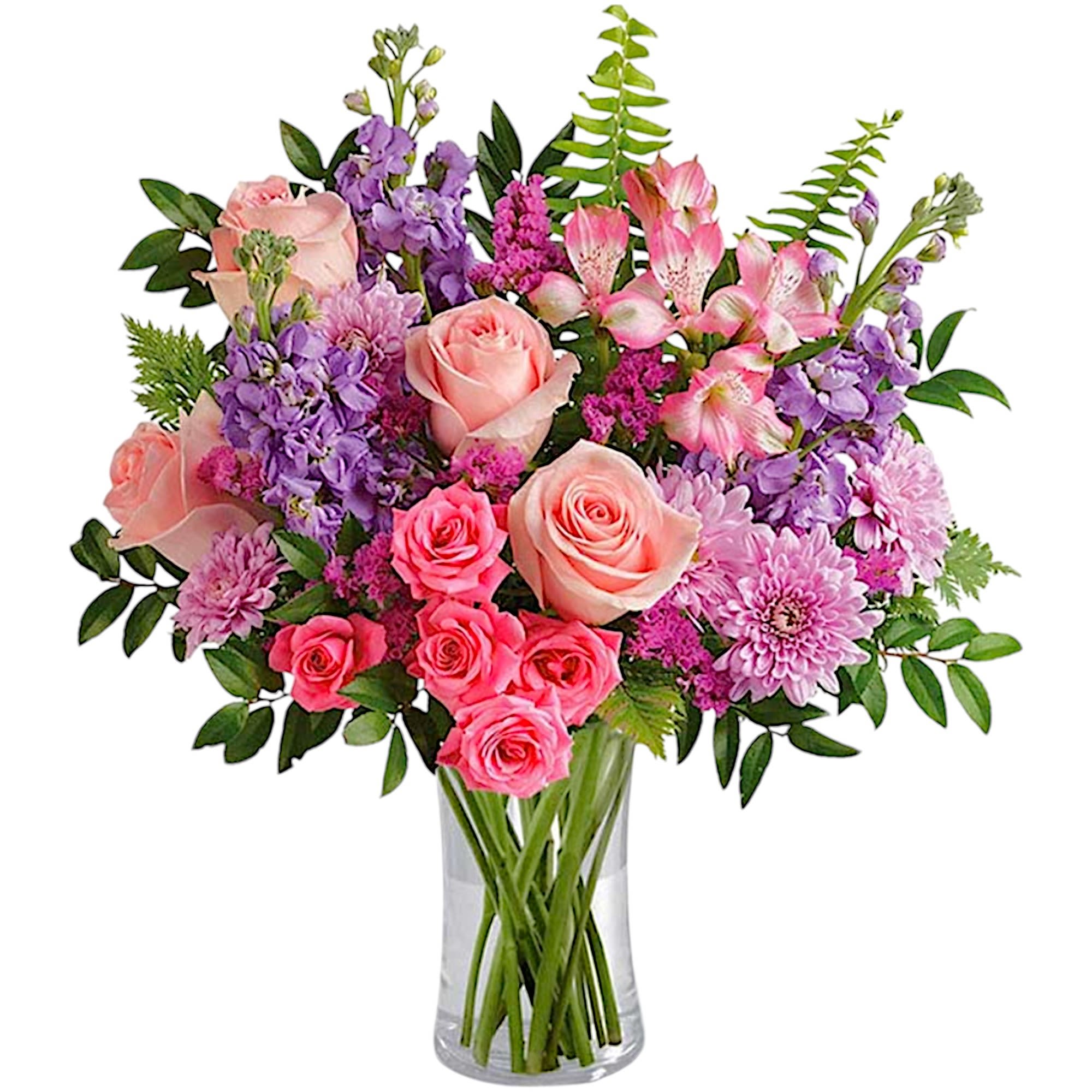 Soft pink roses breathe life into this perfectly feminine arrangement. This charming