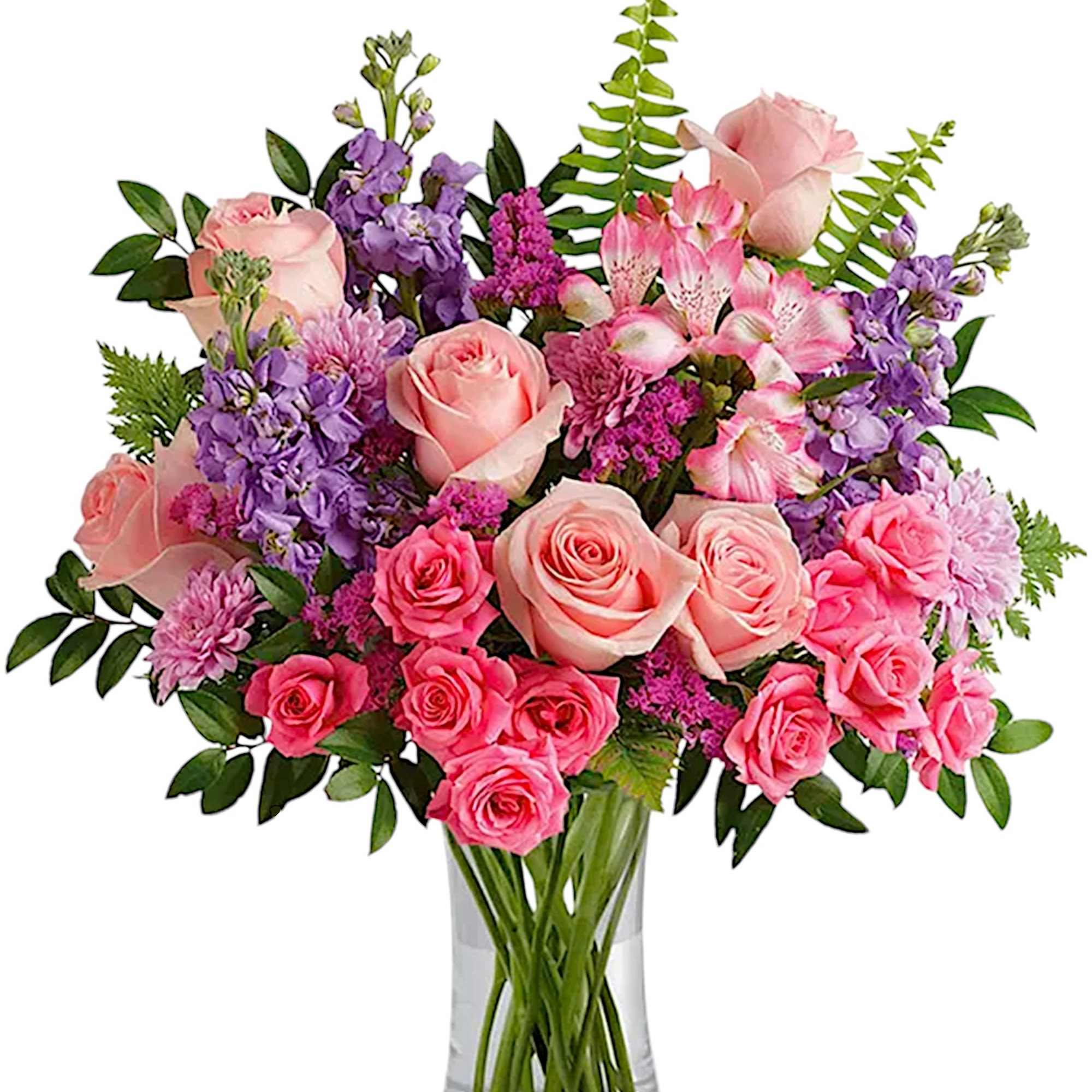 Soft pink roses breathe life into this perfectly feminine arrangement. This charming
