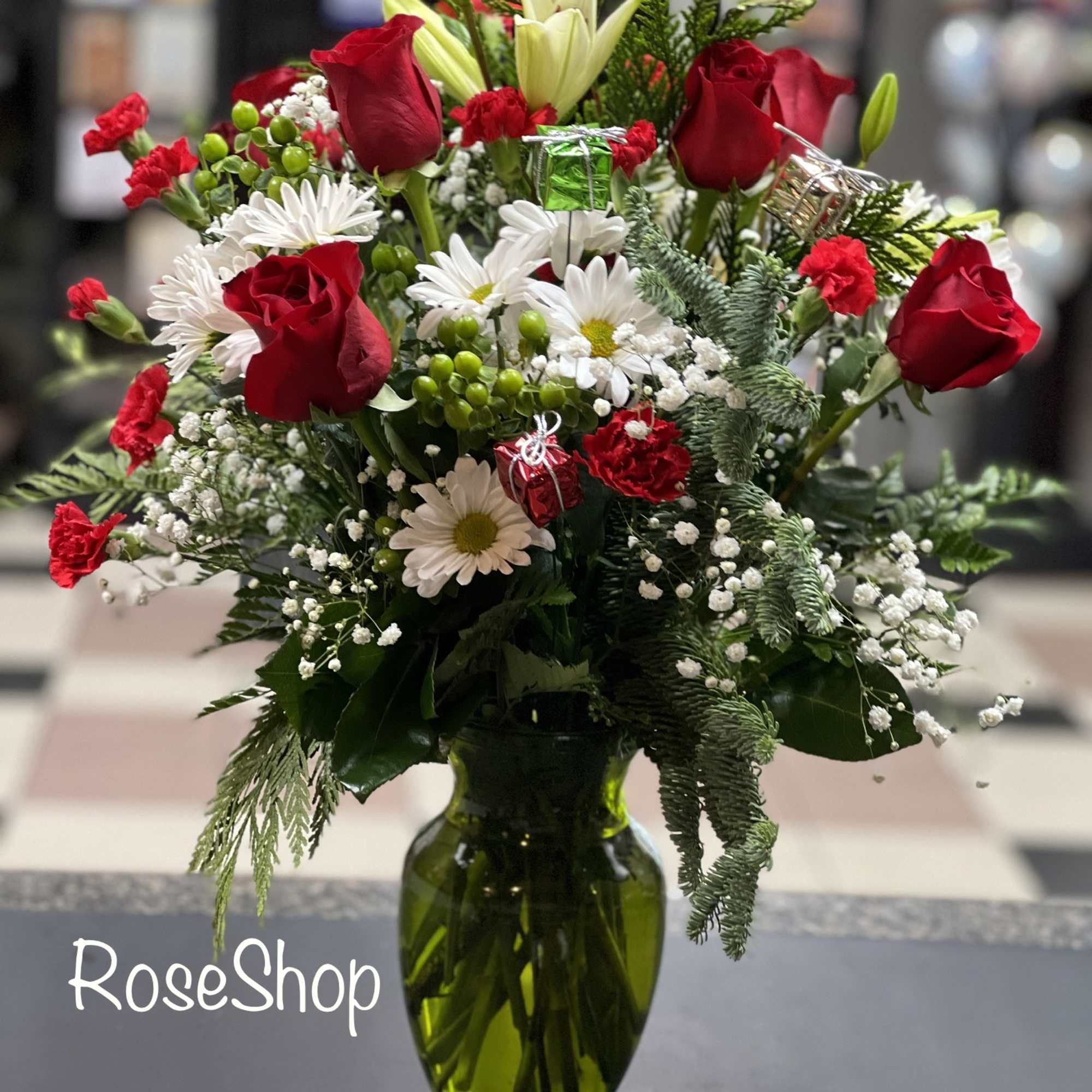 This joyful red  and white bouquet is sure to light up