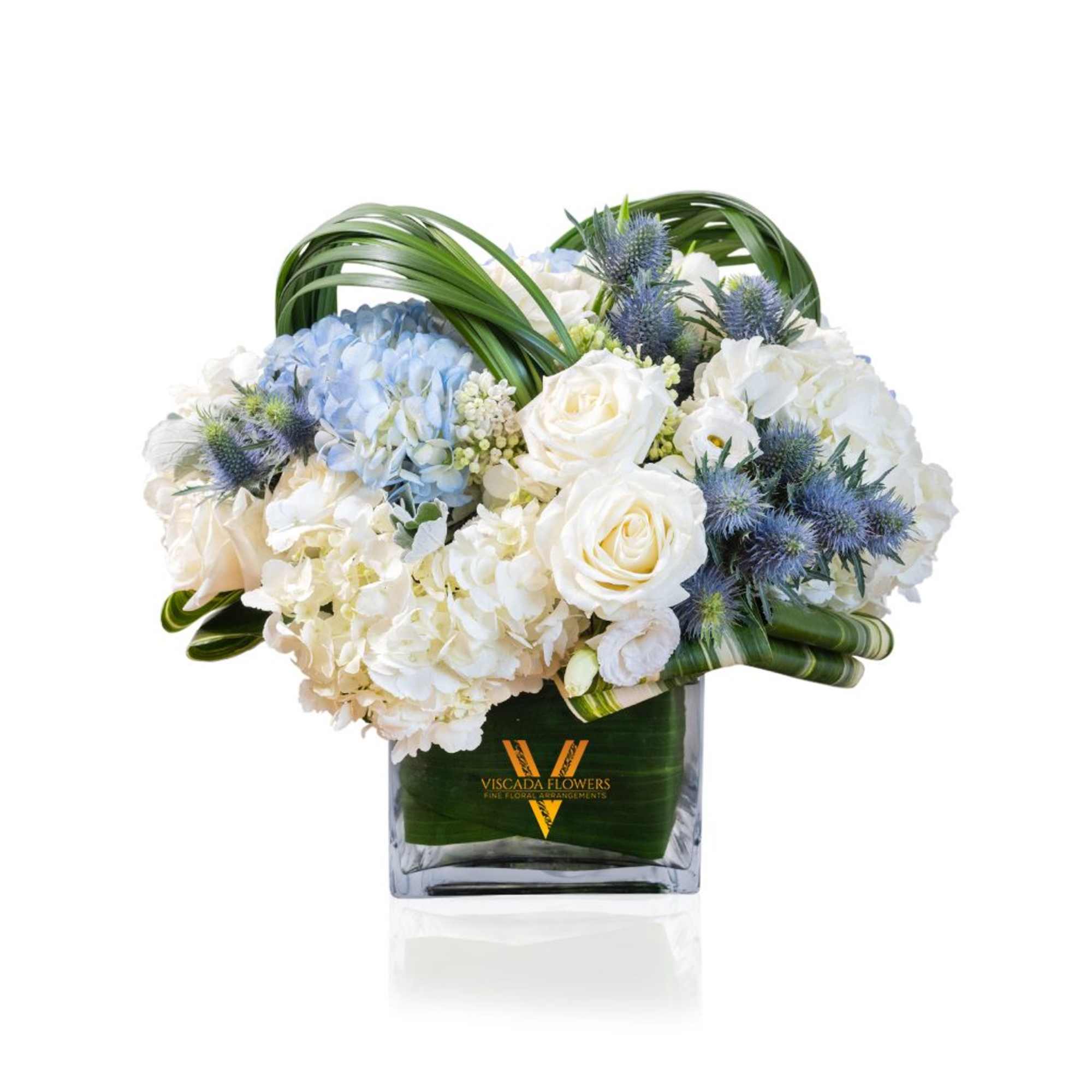 Experience the serene beauty of winter with Blue Frost, a stunning bouquet