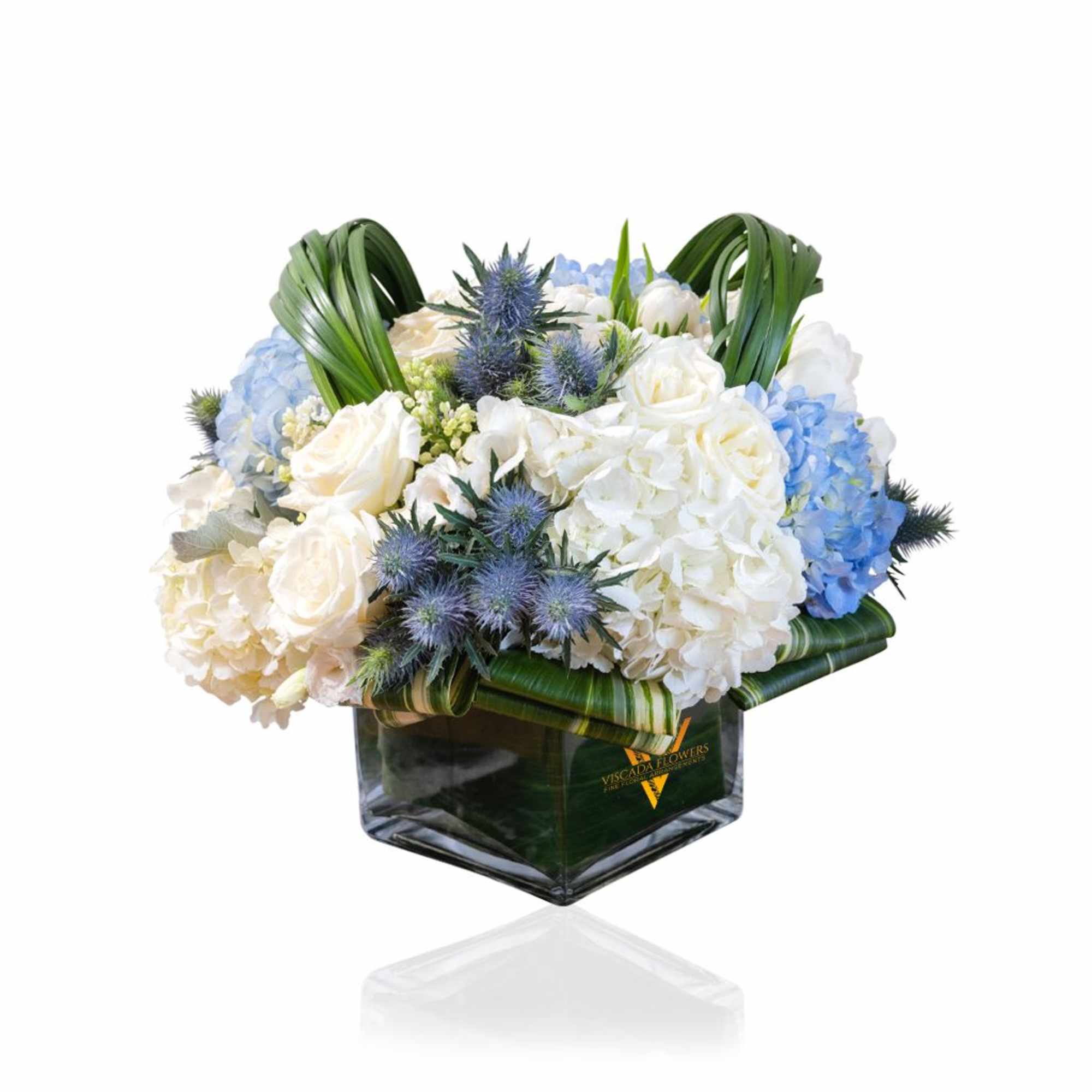 Experience the serene beauty of winter with Blue Frost, a stunning bouquet