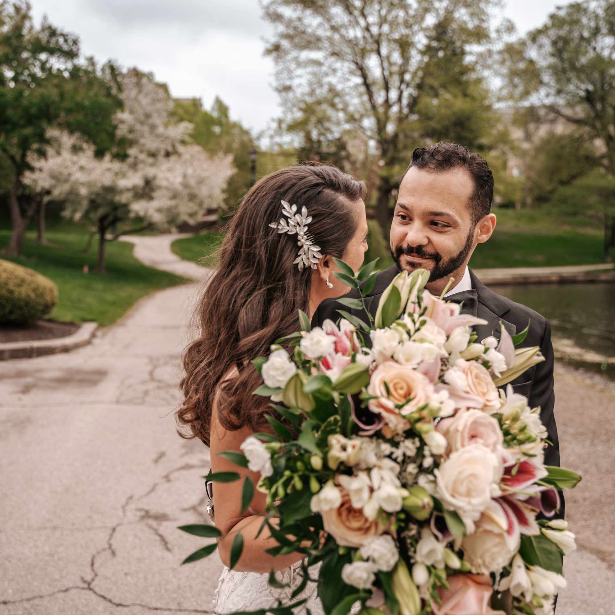 Beautiful stargazer lily, roses, freesia and other filler flowers cascade