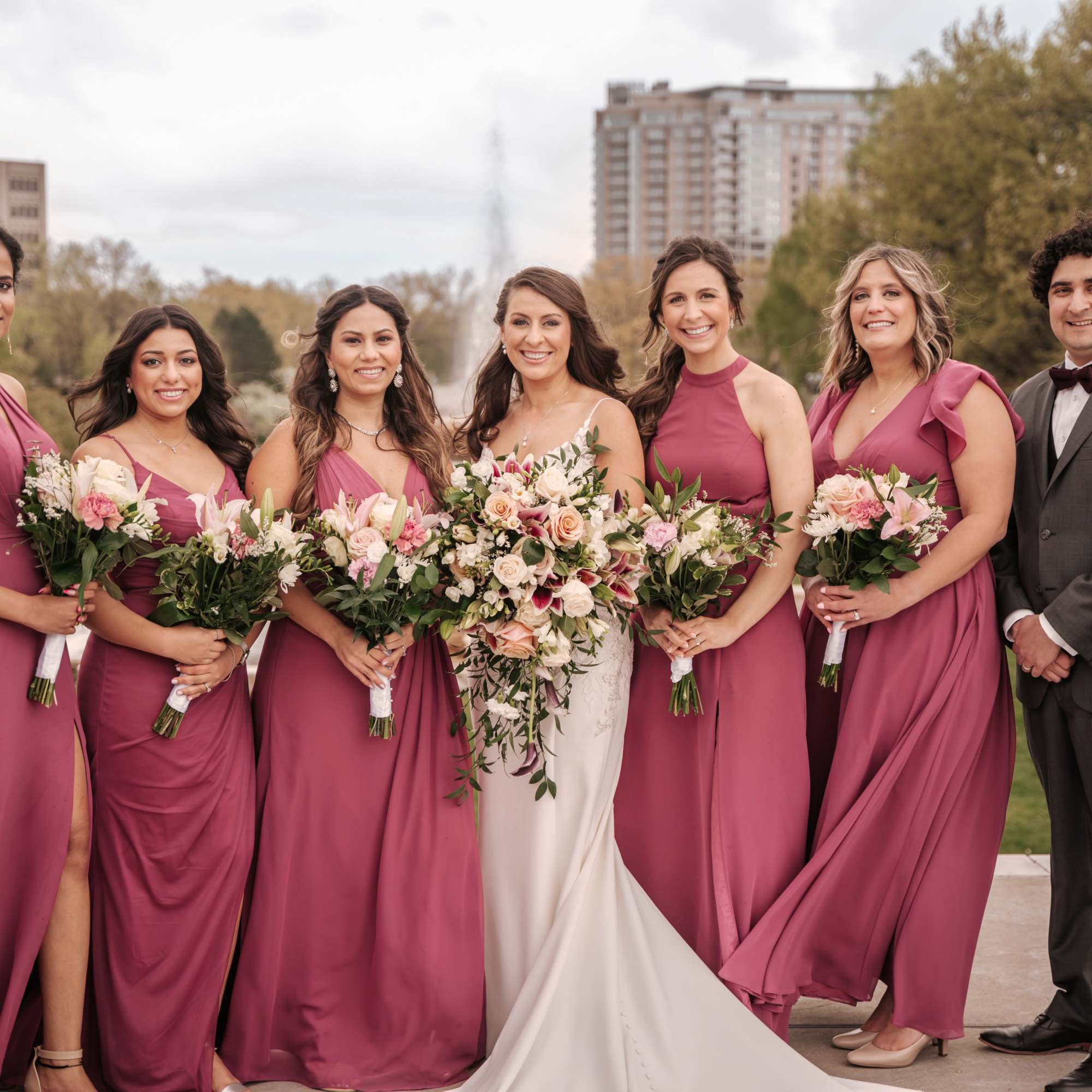 Beautiful stargazer lily, roses, freesia and other filler flowers cascade